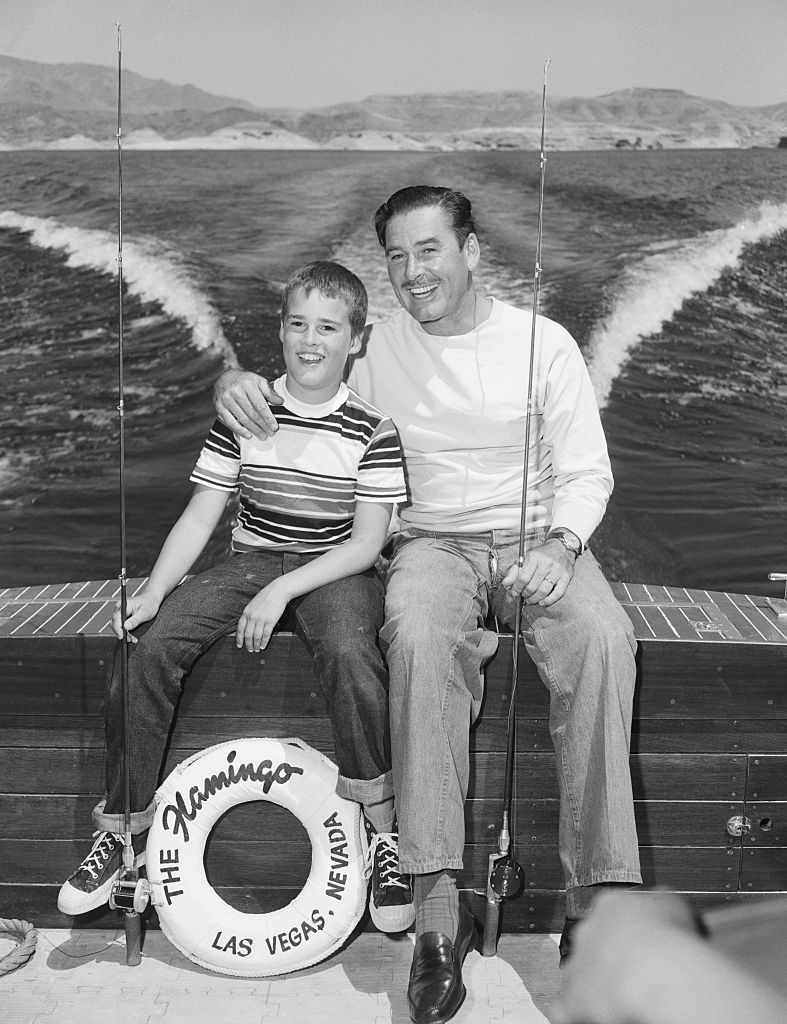 Errol Flynn and son, Sean on a fishing trip on Lake Mead, near Las Vegas on 01 July, 1951 | Photo: Getty Images