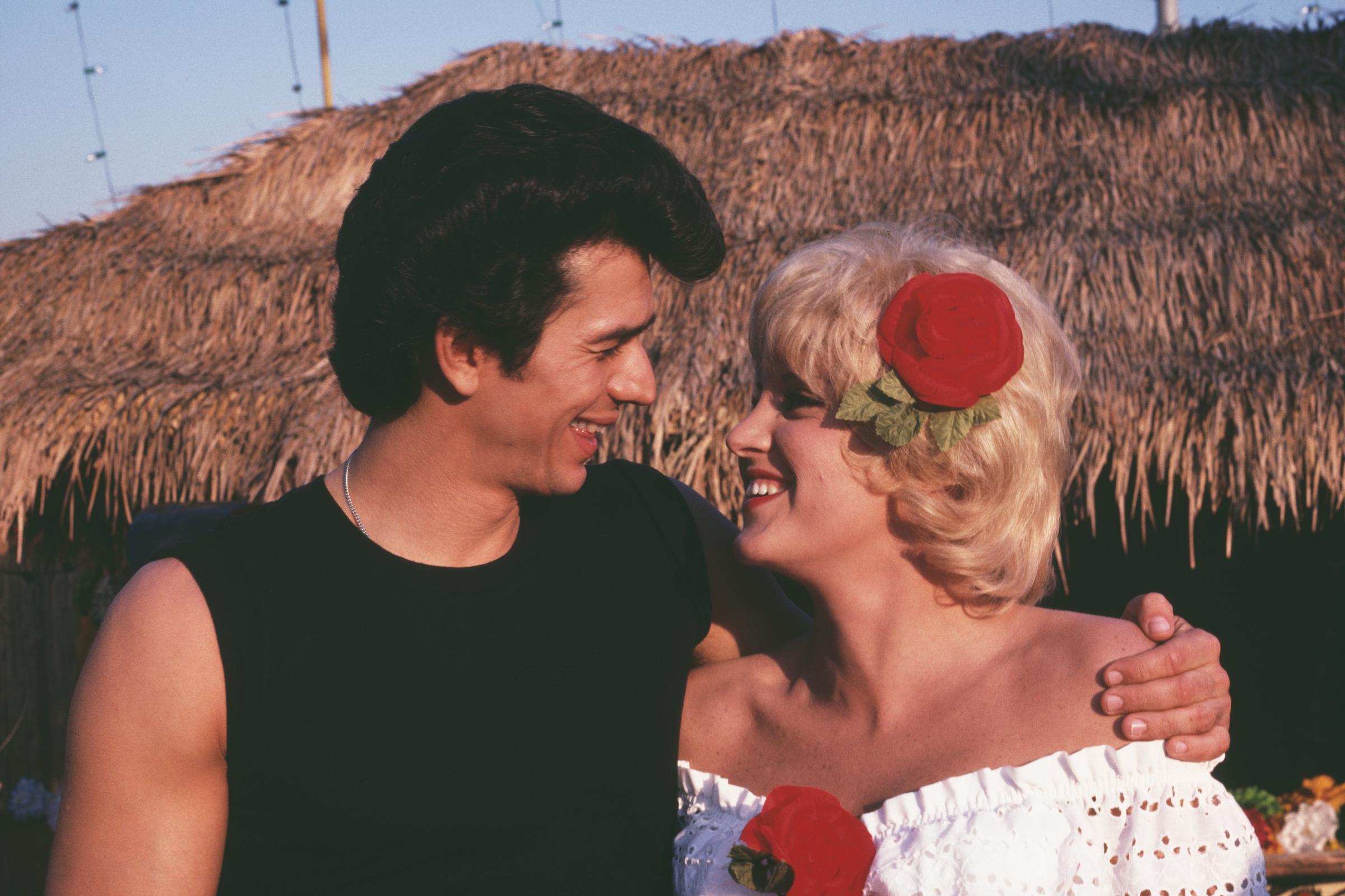 Adrian Zmed and the actress on the set of "Grease 2," 1981 | Source: Getty Images