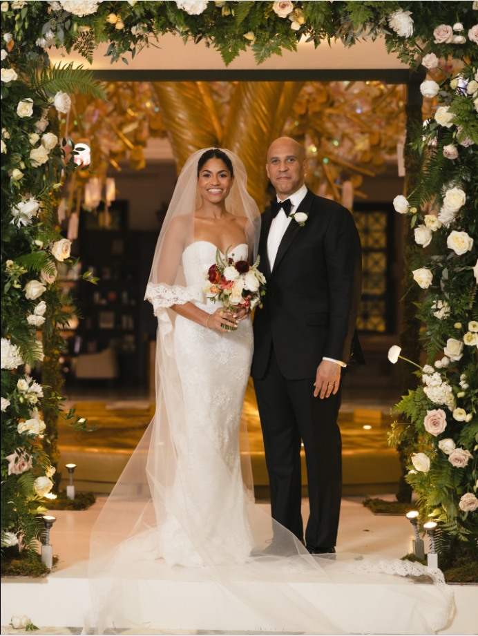 Cory Booker and Alexis Lewis, as seen from a post dated November 30, 2025. | Source: Facebook/CoryBooker