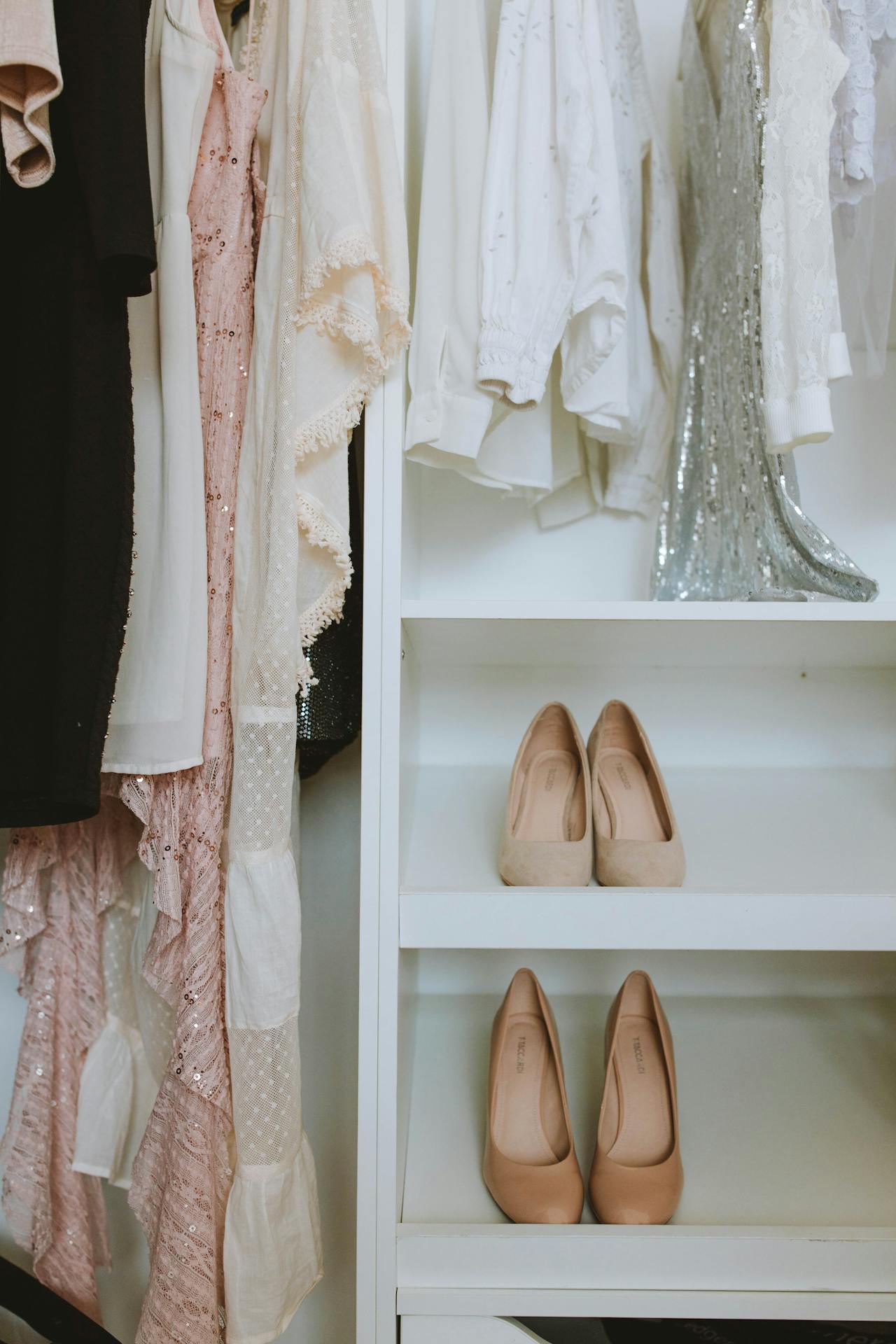 Dresses and shoes in a closet | Source: Pexels