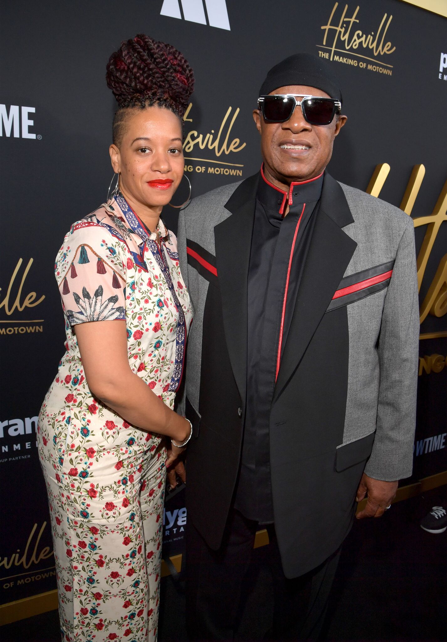 Tomeeka Robyn Bracy and Stevie Wonder attend the World Premiere and After Party of Showtime's "HITSVILLE: The MAKING OF MOTOWN" at Harmony Gold Theatre | Getty Images