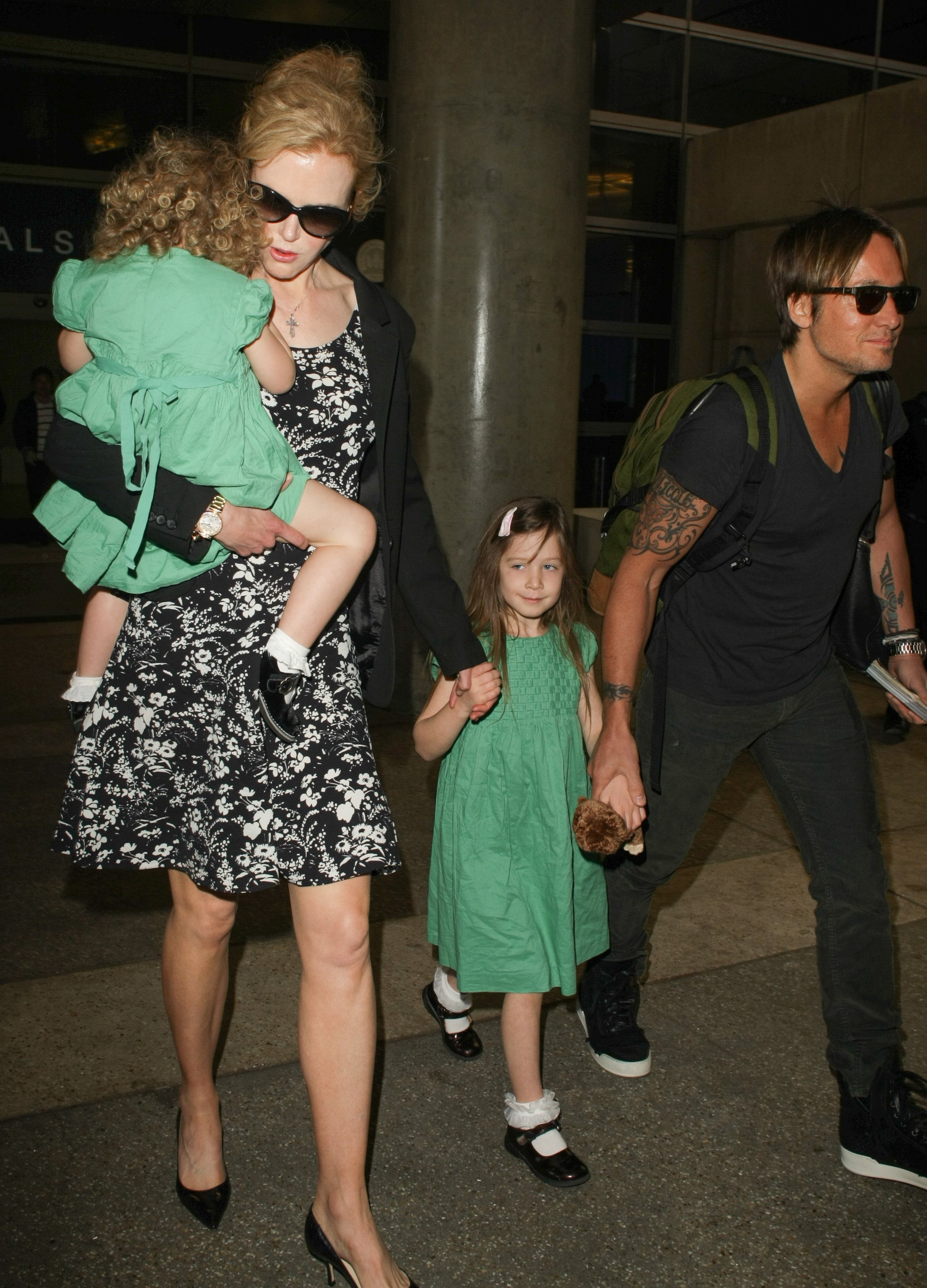 Nicole Kidman, Keith Urban and their daughters, Sunday Rose Kidman Urban and Faith Margaret Kidman Urban are seen at LAX airport on January 02, 2014 in Los Angeles, California. | Source: Getty Images