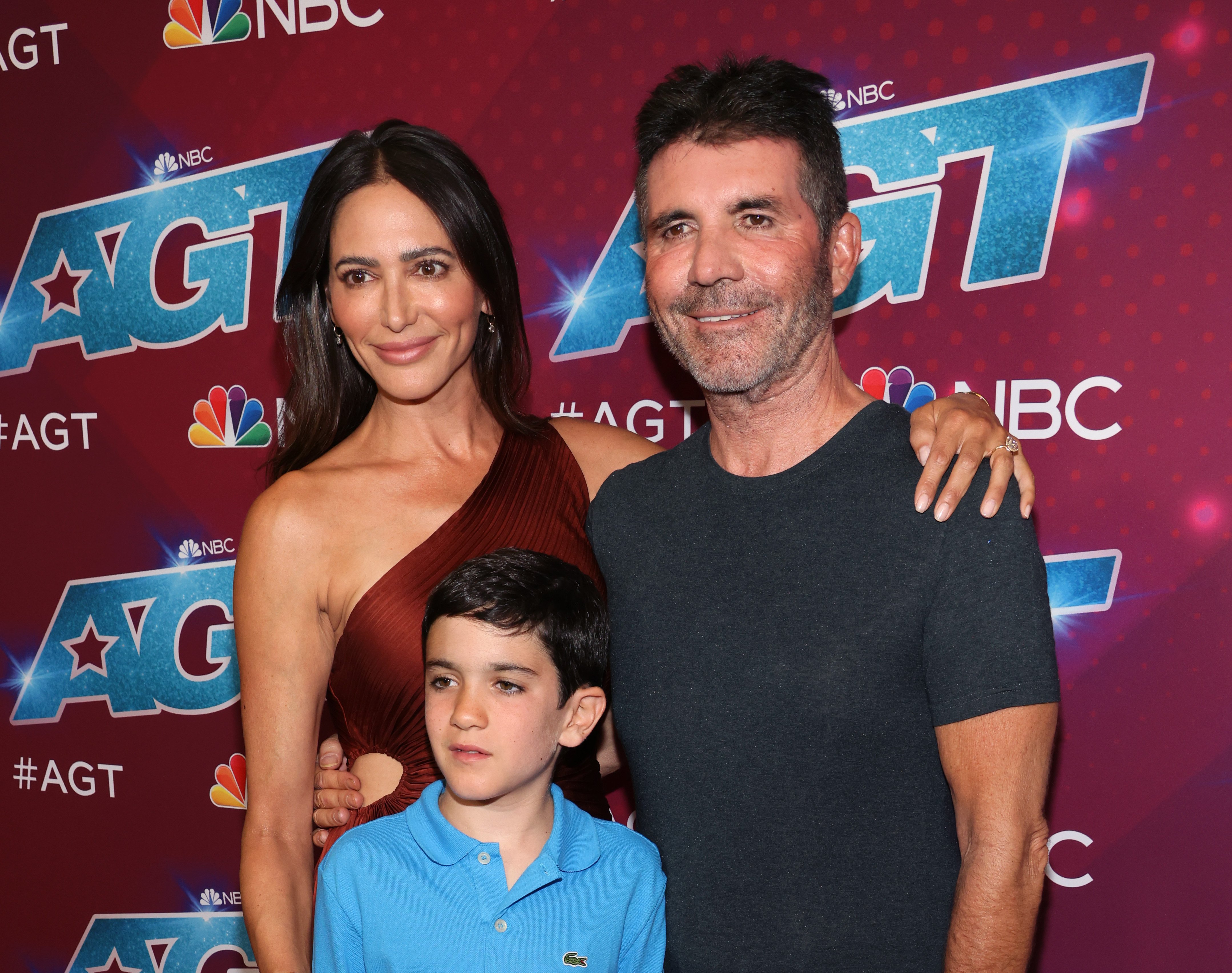 Lauren Silverman, Eric Cowell, and Simon Cowell on the red carpet for "America's Got Talent" season 17 live show on September 13, 2022, in Pasadena, California. | Source: Getty Images