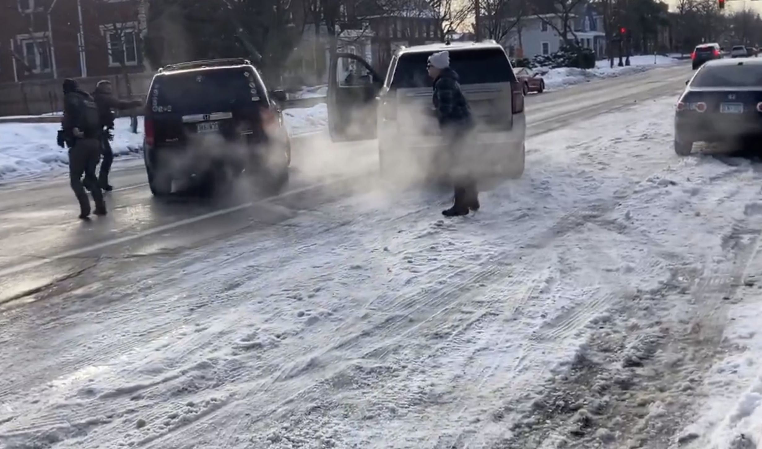 An ICE agent is seen pointing his gun at Renee Nicole Good as she attempts to drive away on January 7, 2026 | Source: X/maxnesterak