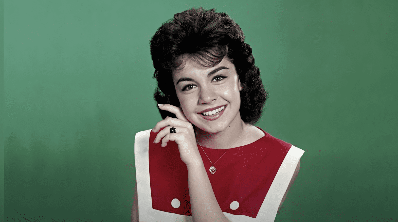 Annette Funicello's portrait against a green background. | Source: Youtube/FactsVerse