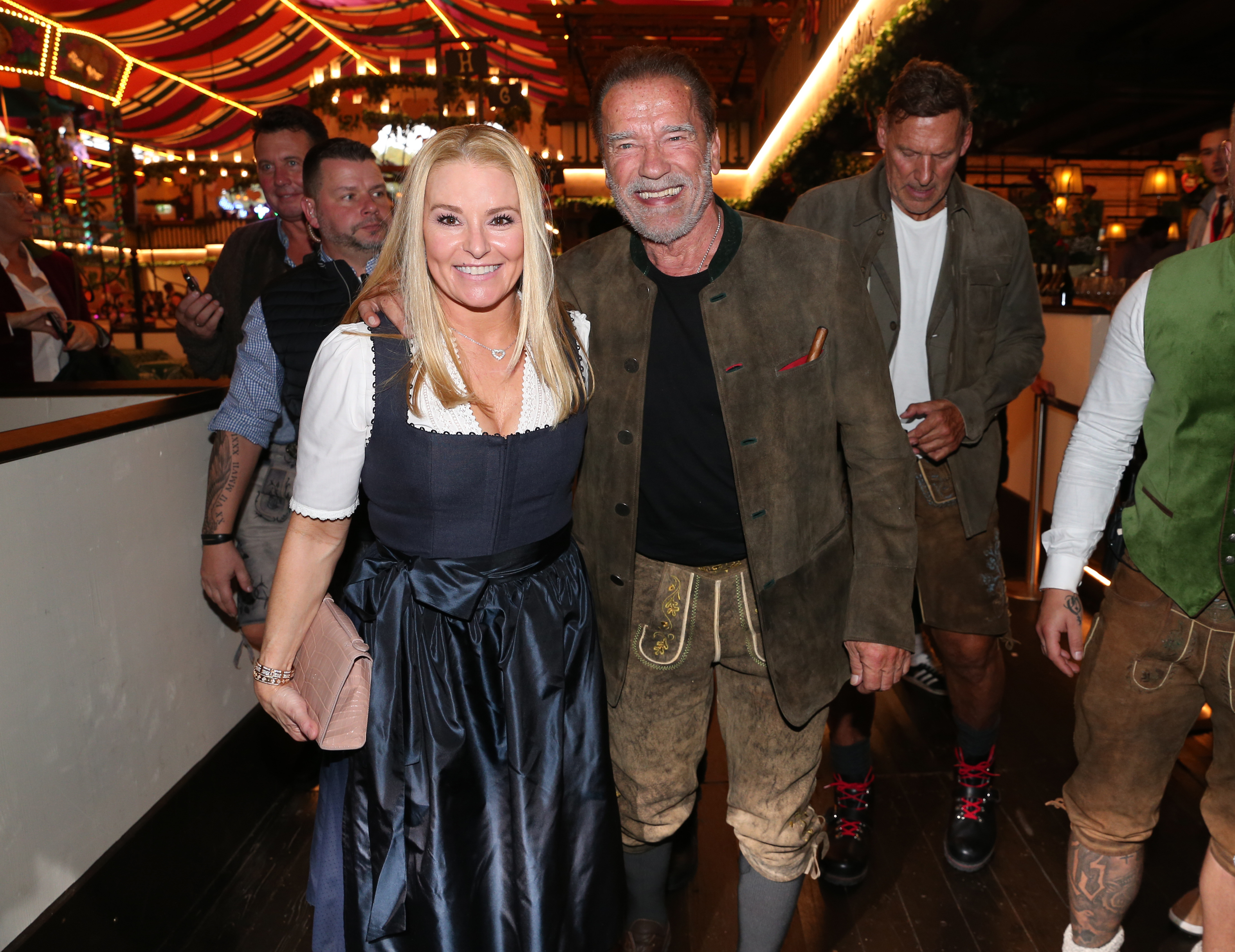 Arnold Schwarzenegger and his girlfriend Heather Milligan during the 187th Oktoberfest at Marstall tent /Theresienwiese on September 24, 2022 in Munich, Germany | Source: Getty Images