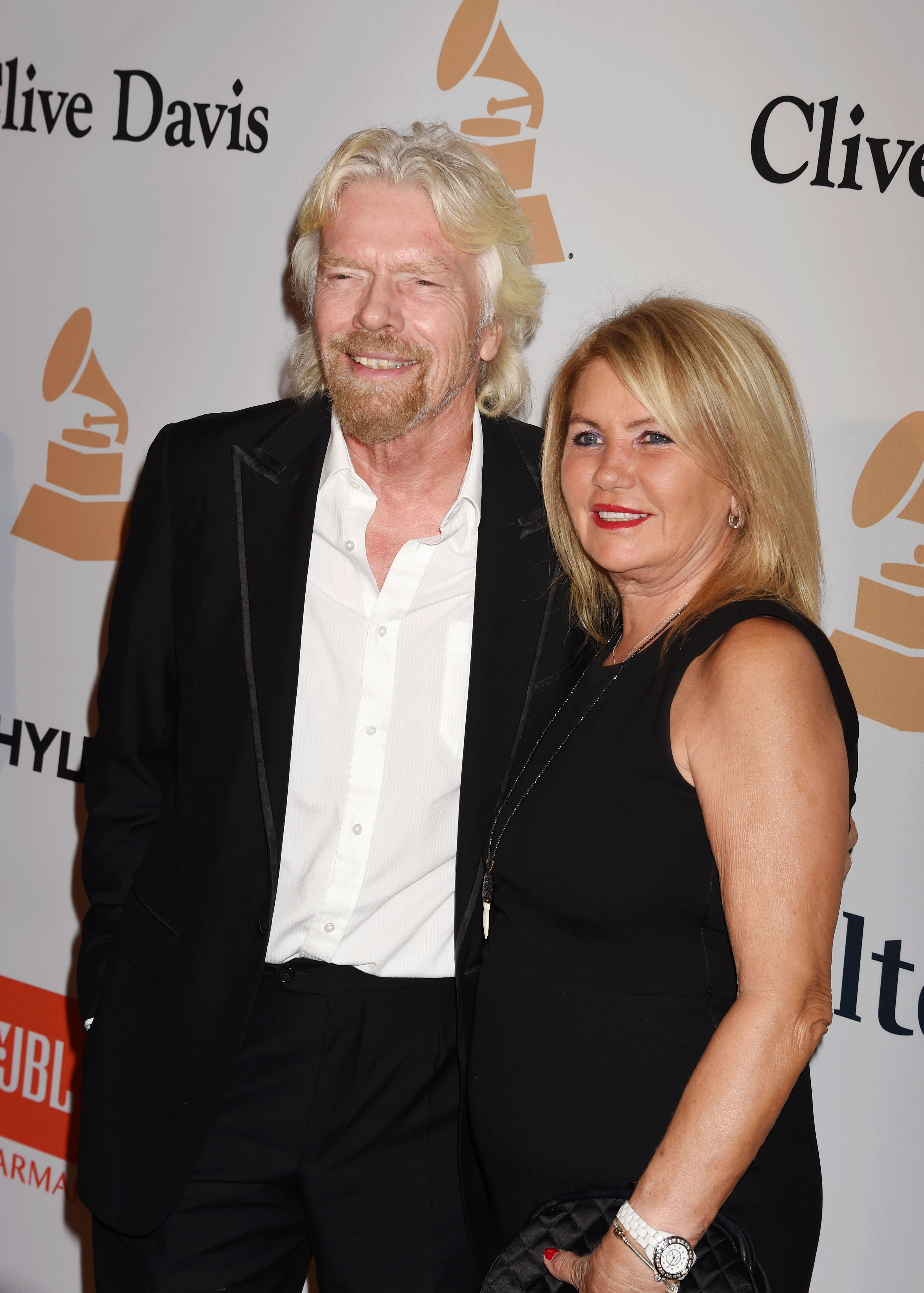 Richard Branson and Joan Templeman attend the Pre-GRAMMY Gala and Salute to Industry Icons honoring Irving Azoff at The Beverly Hilton Hotel on February 14, 2016 in California | Source: Getty Images