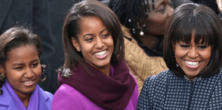 An image of Sasha, Malia, and Michelle Obama for an article about the former First Lady’s “Becoming” documentary on May 5, 2020 | Photo: Twitter/@enews
