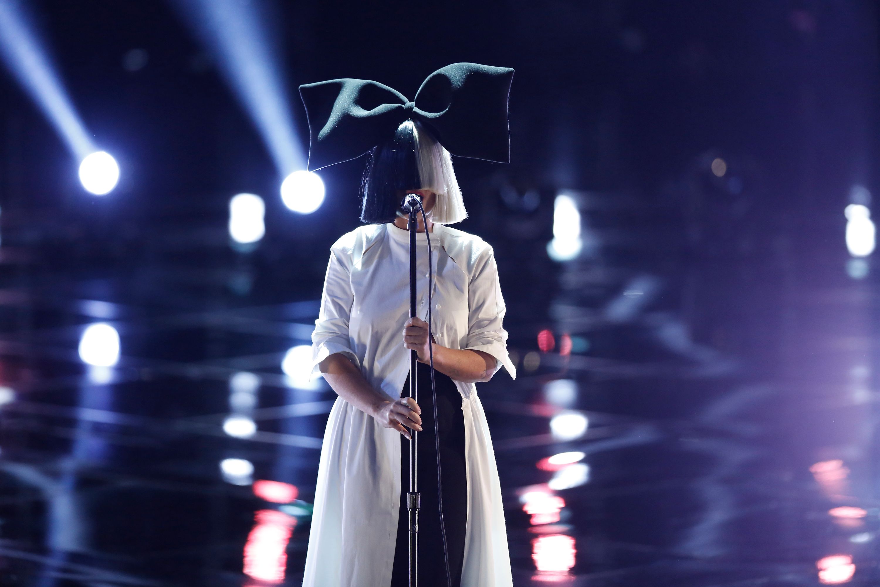 Sia performs during "The Voice Live Top 10." | Source: Getty Images