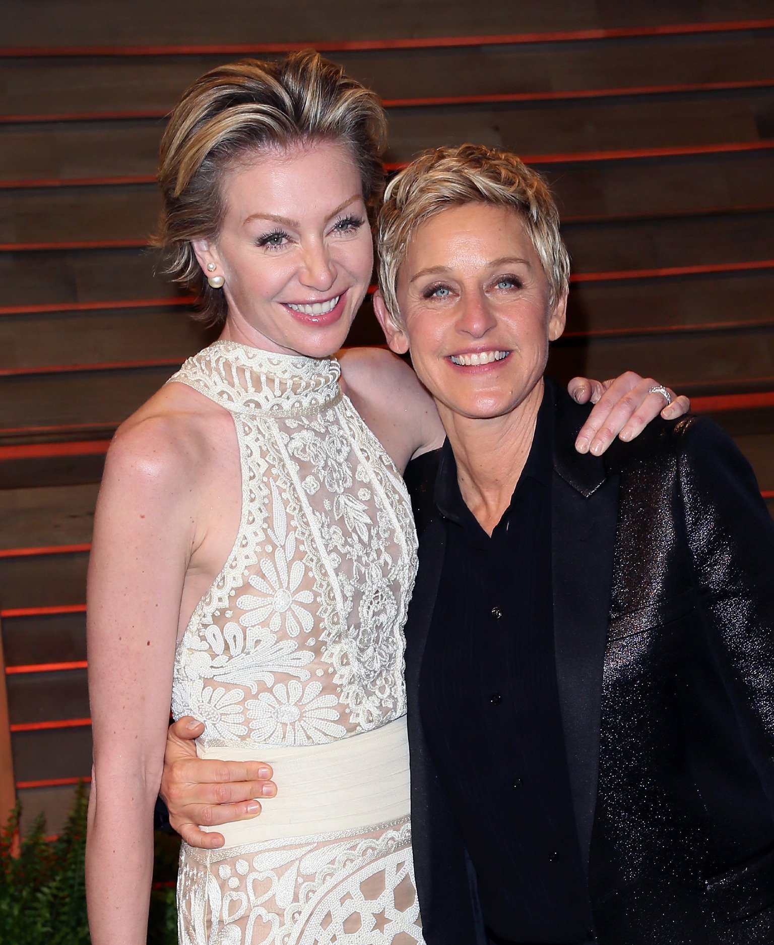  Ellen DeGeneres (R) and spouse actress Portia de Rossi attend the 2014 Vanity Fair Oscar Party  | Getty Images