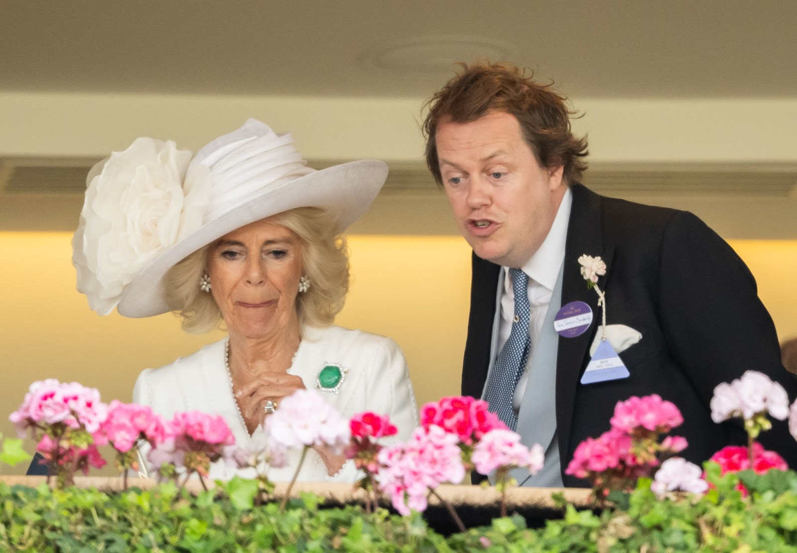 Queen Camilla and Tom Parker Bowles attended day three of Royal Ascot on June 20, 2024, in England. The mother and son shared a moment together at the iconic event, highlighting their close family bond. | Source: Getty Images