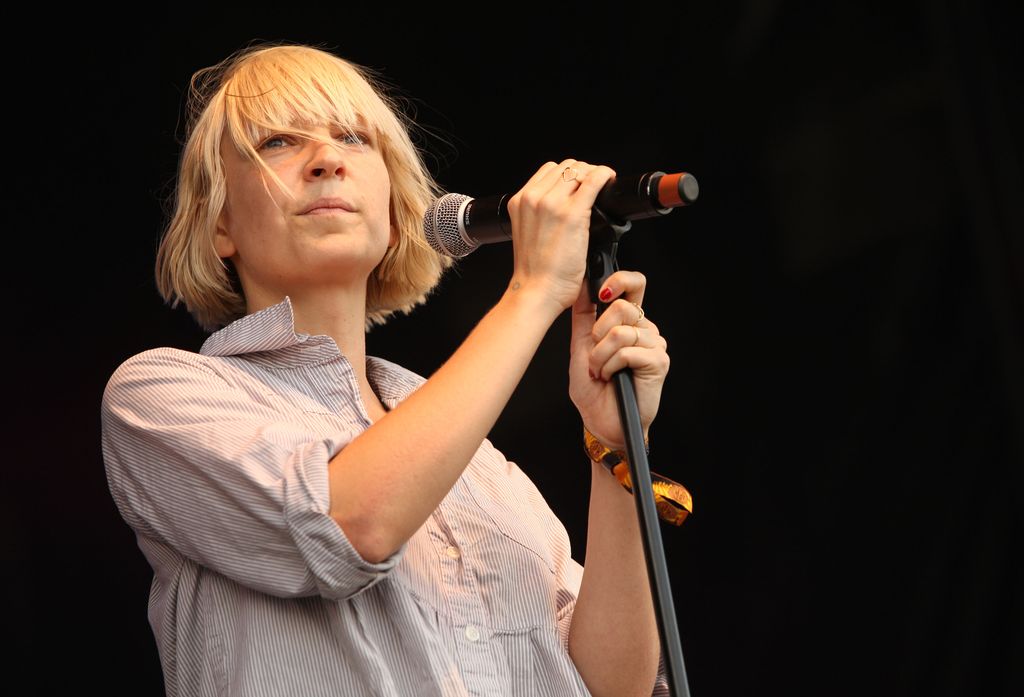 Sia performs during the 2008 All Points West music and arts festival at Liberty State Park on August 9, 2008 in Jersey City, New Jersey. | Source: Getty Images
