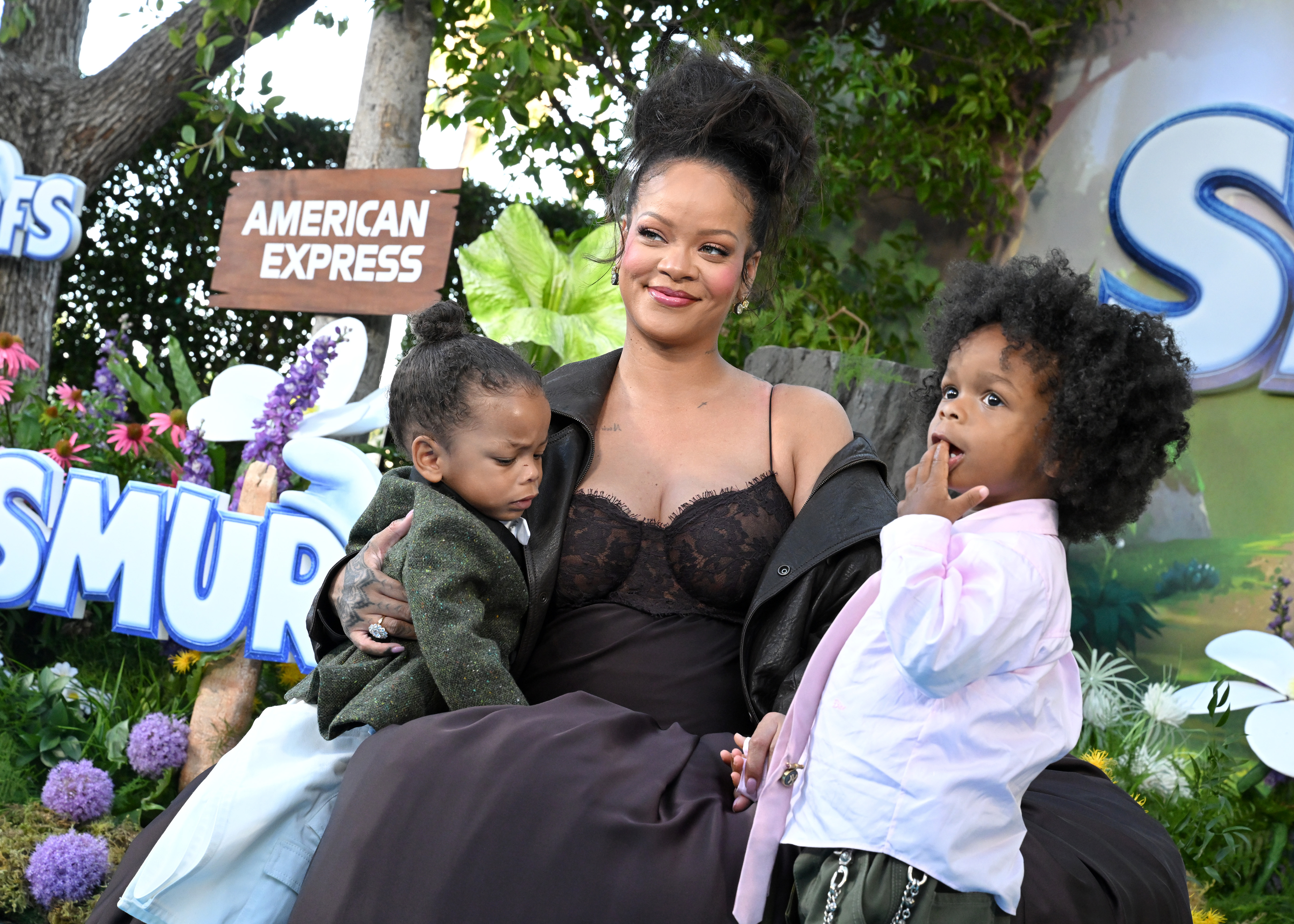 Rihanna with her sons Riot Rose Mayers and RZA Athelston Mayers at the Los Angeles premiere of ''Smurfs'' at Paramount Pictures Studios, July 13, 2025 | Source: Getty Images