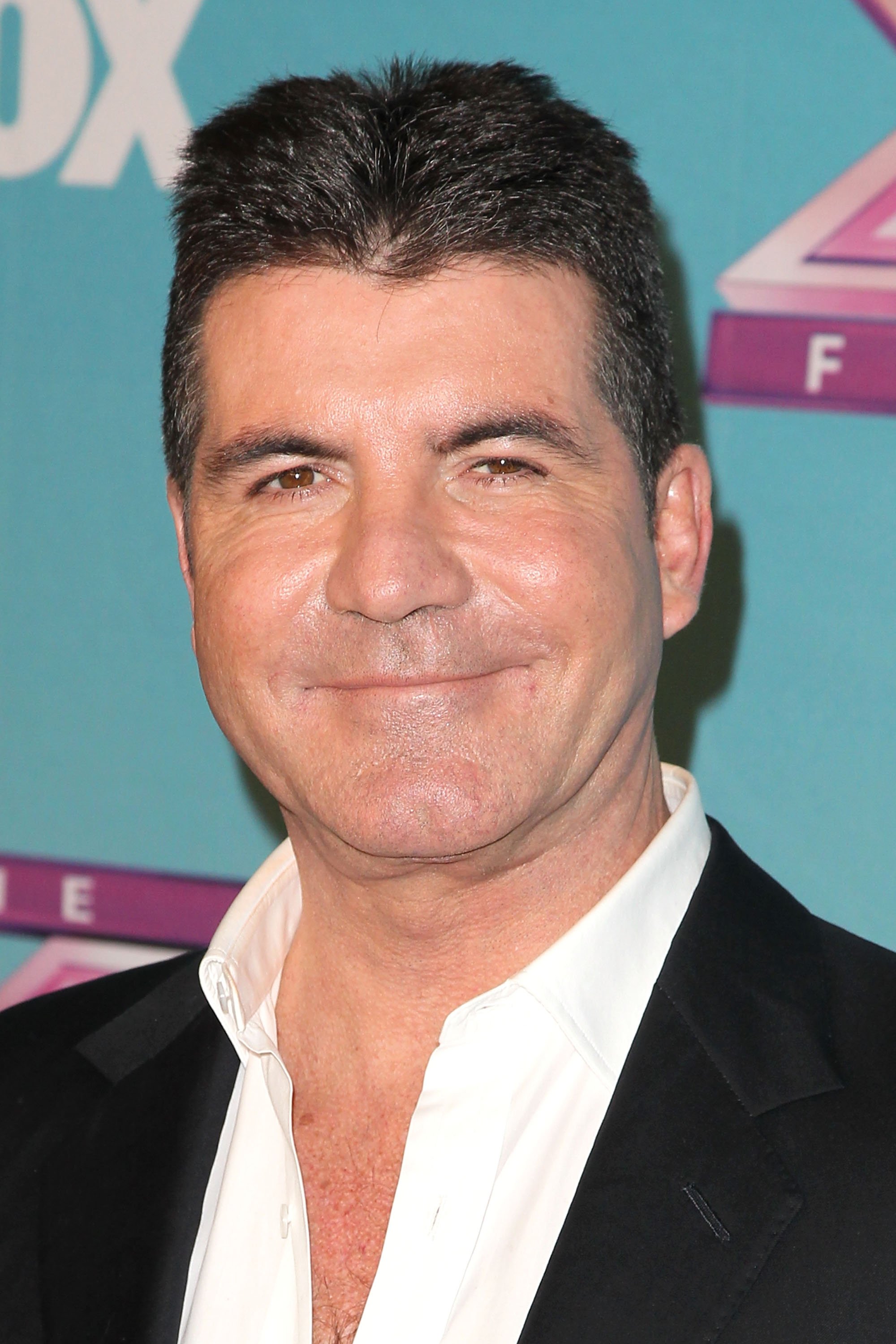 Simon Cowell attends Fox's "The X Factor" Season Finale at CBS Television City on December 20, 2012, in Los Angeles, California. | Source: Getty Images