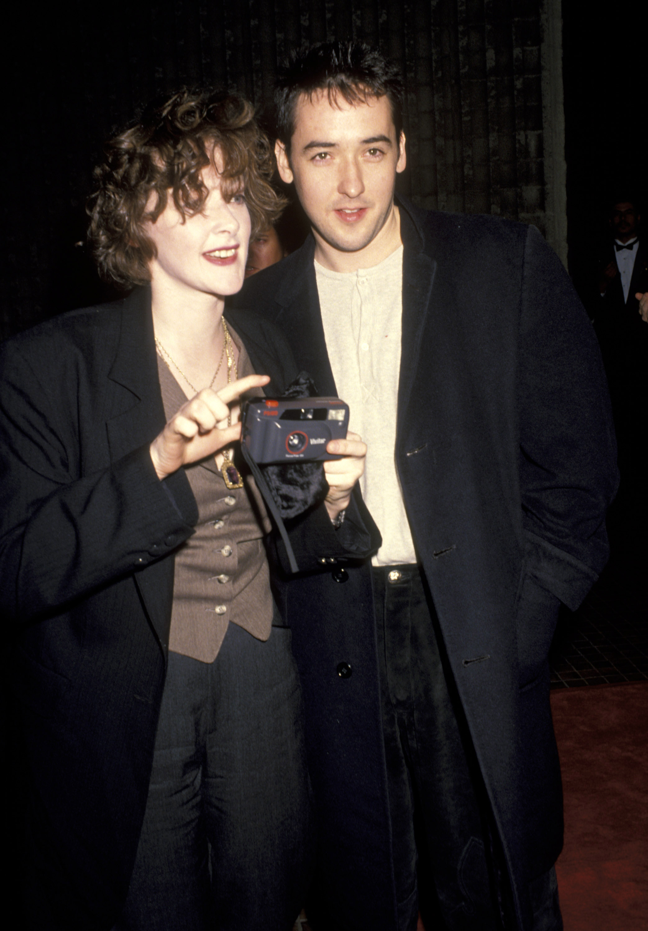 The actress and her brother John Cusack during the "Toys" Premiere on December 13, 1992. | Source: Getty Images