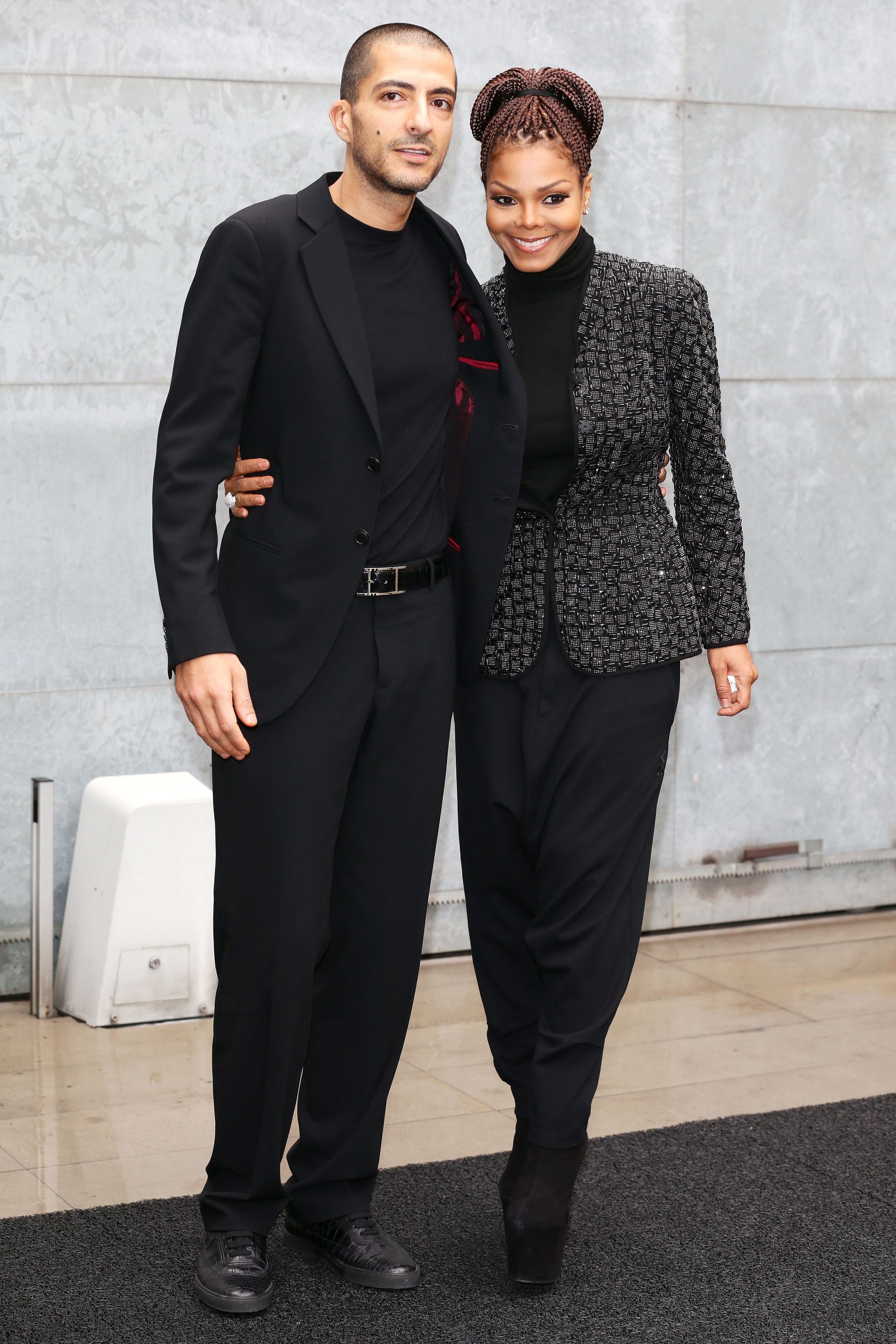 Wissam al Mana and Janet Jackson during the Giorgio Armani fashion show during Milan Fashion Week Womenswear Fall/Winter 2013/14 on February 25, 2013, in Milan, Italy. | Source: Getty Images
