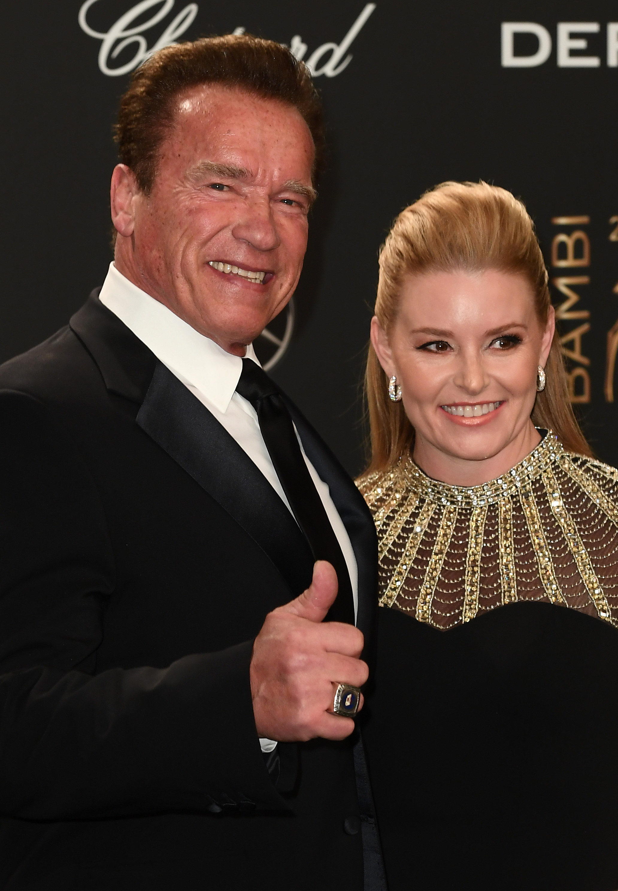 Arnold Schwarzenegger and his partner Heather Milligan arrive at the Bambi Awards 2017 at Stage Theater on November 16, 2017 in Berlin, Germany | Source: Getty Images