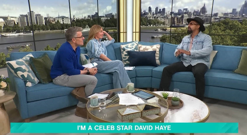 David Haye gestures while speaking to Cat Deeley and Ben Shephard on the studio sofa, as the conversation turns to his campmate clash. | Source: YouTube/This Morning