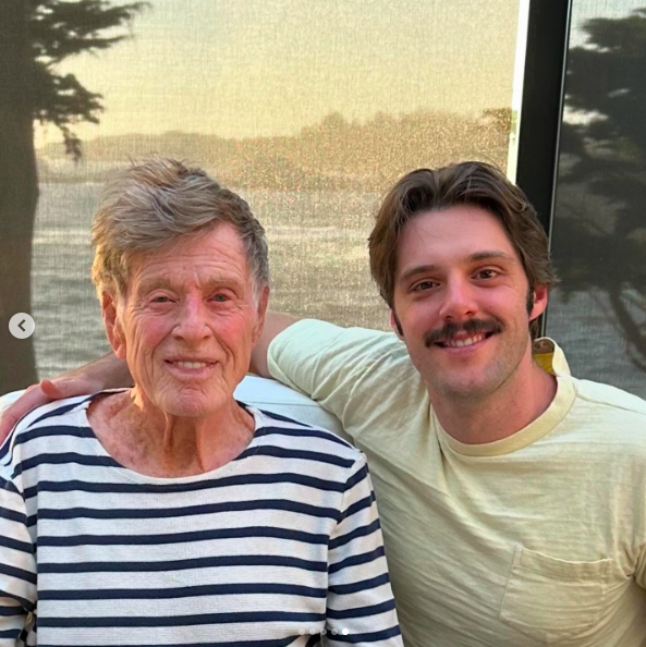 Robert Redford and Conor Schlosser posing for a photo together, posted on September 16, 2025. | Source: Instagram/conorschlosser