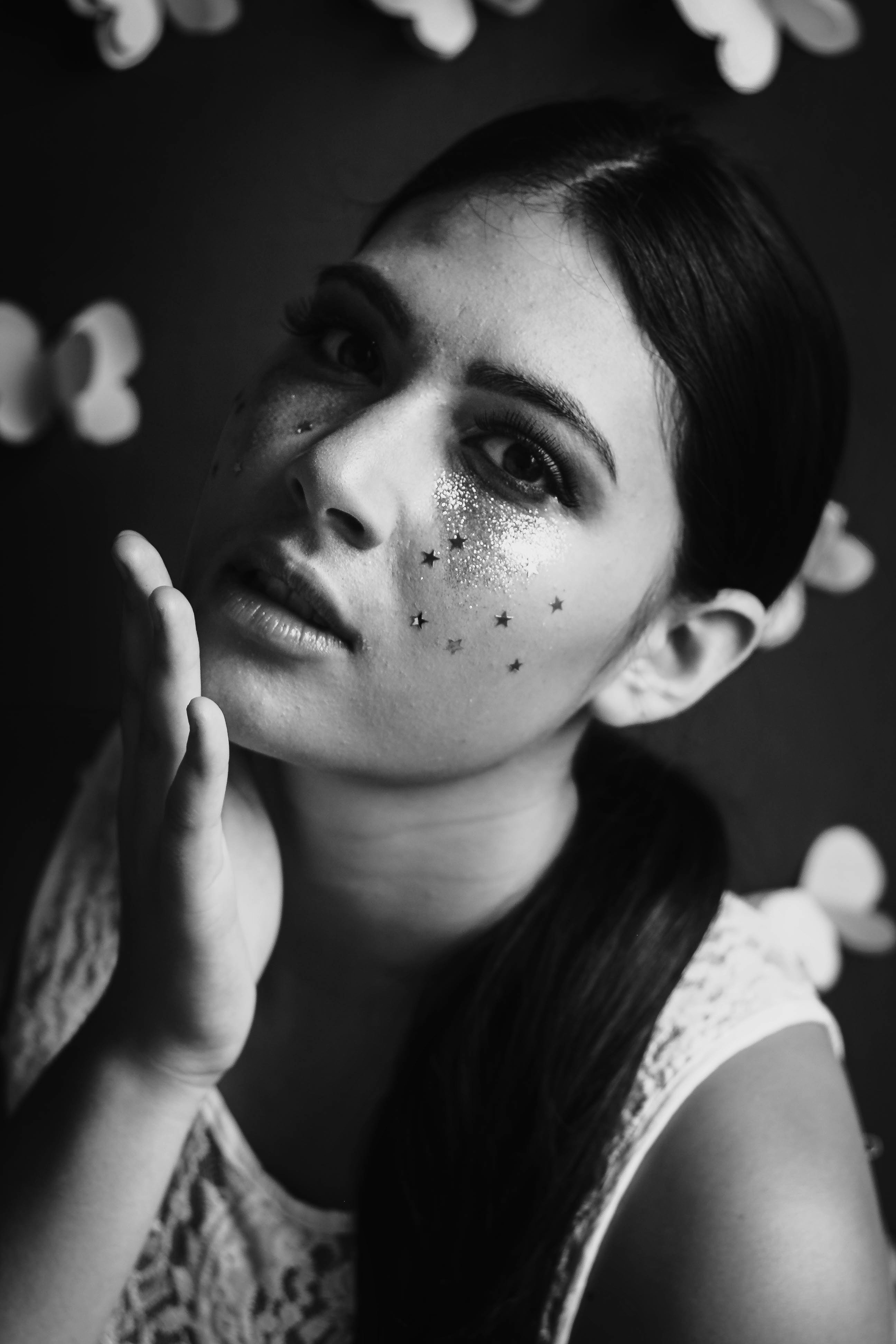 Stars on face. | Source: Pexels