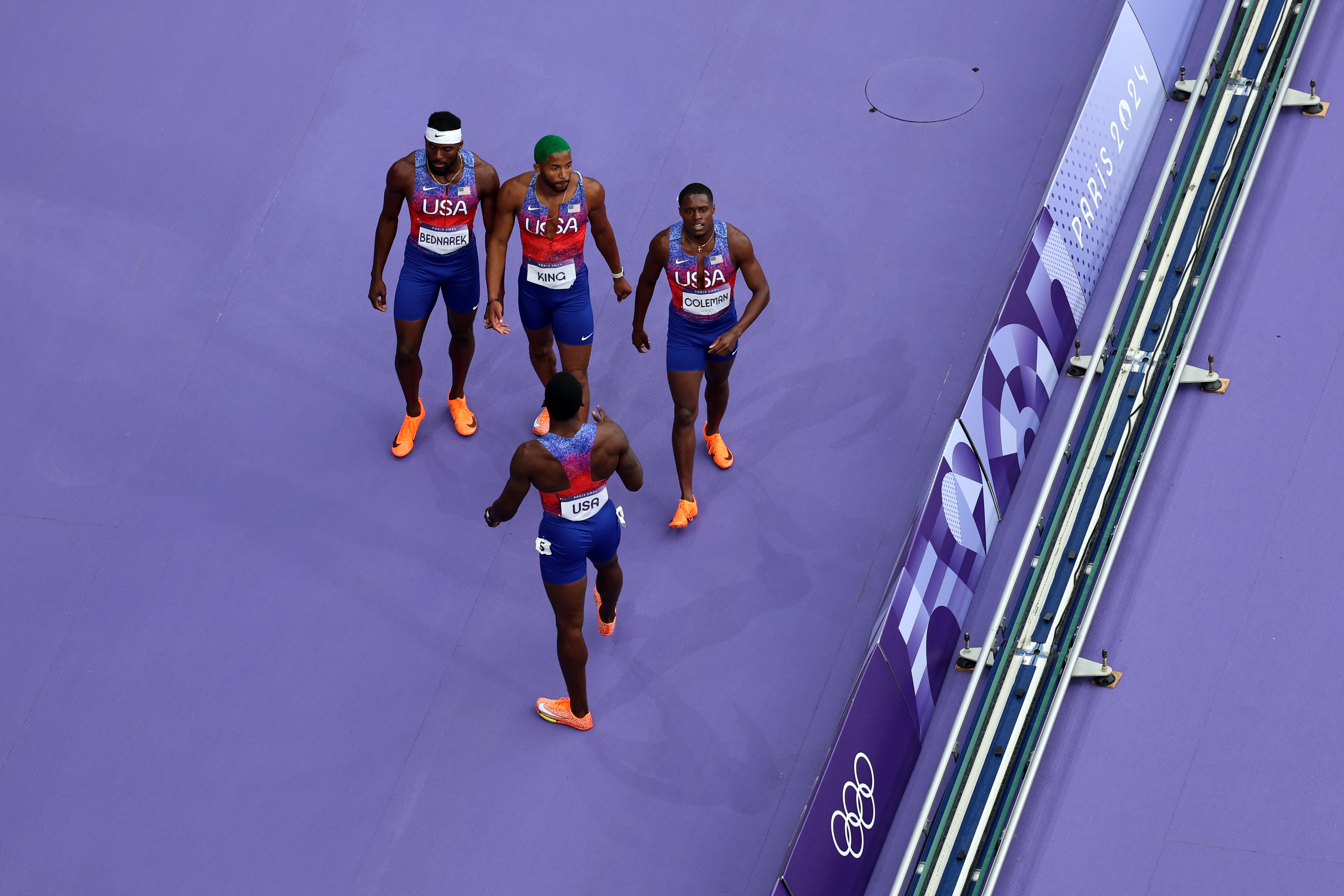 Kenneth Bednarek, Christian Coleman, Fred Kerley, and Kyree King reacting to being disqualified from the Men's 4x100-meter Relay Final during the 2024 Summer Olympics on August 9, in France. | Source: Getty Images