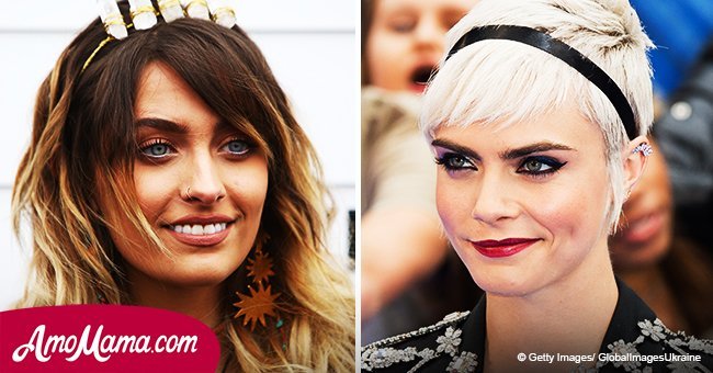 Paris Jackson confirms her romance with Cara Delevingne as they share a passionate kiss in public