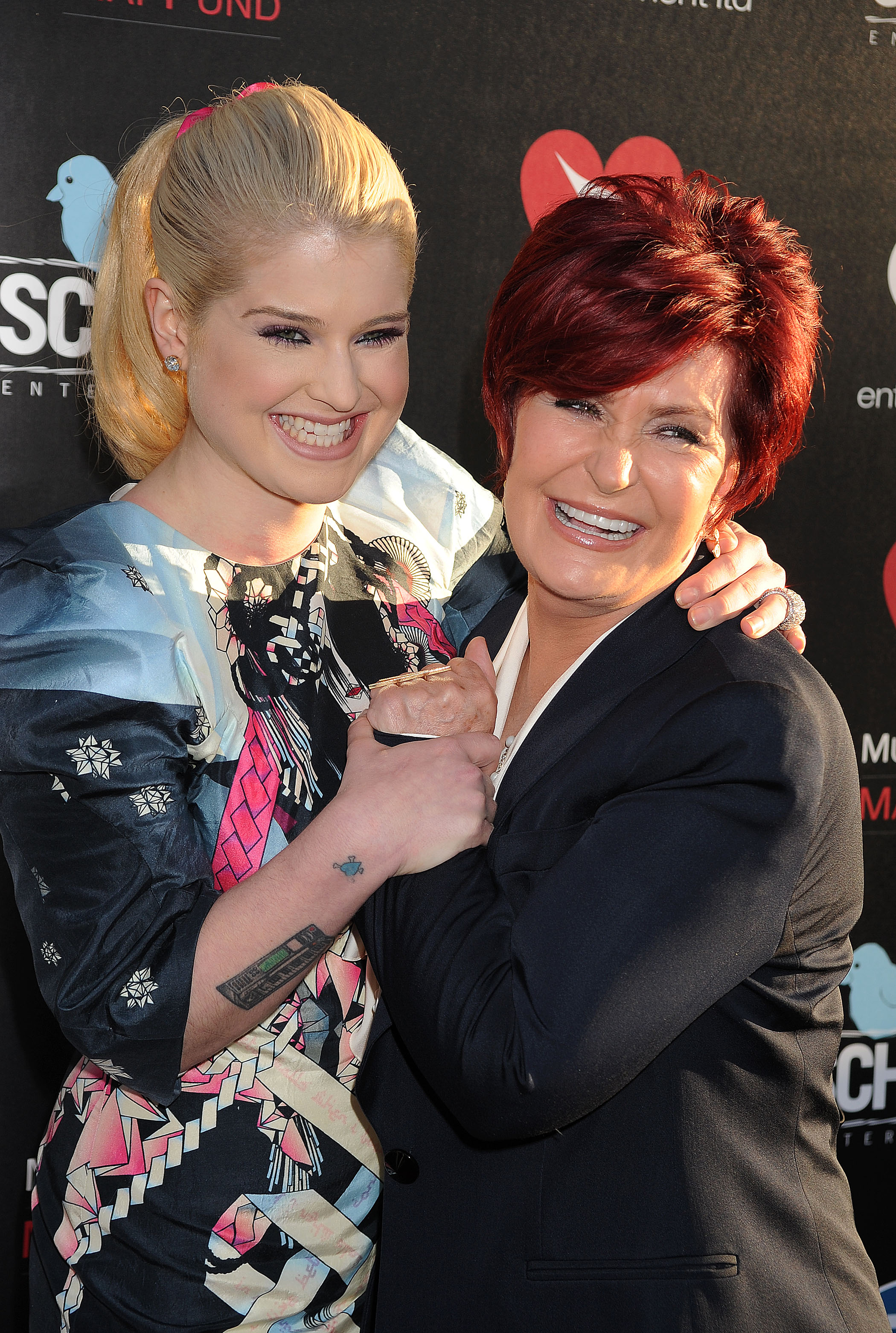 Kelly and Sharon Osbourne at Screening Of "God Bless Ozzy Osbourne" To Benefit The Musicares Map Fund in 2011 | Source: Getty Images