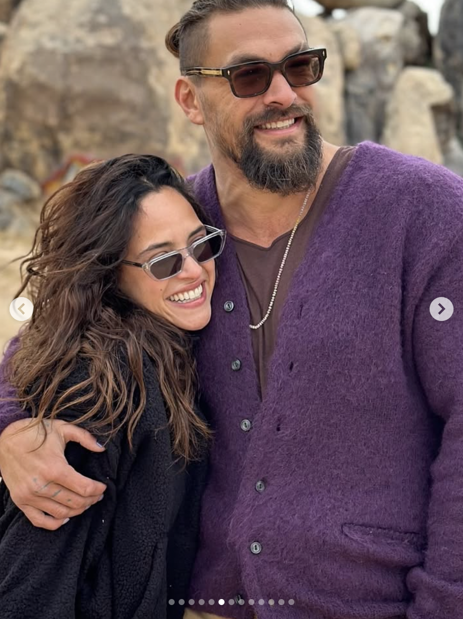 Adria Arjona and Jason Momoa share a hug, as seen in a photo dated August 1, 2025 | Source: Instagram/adriaarjona