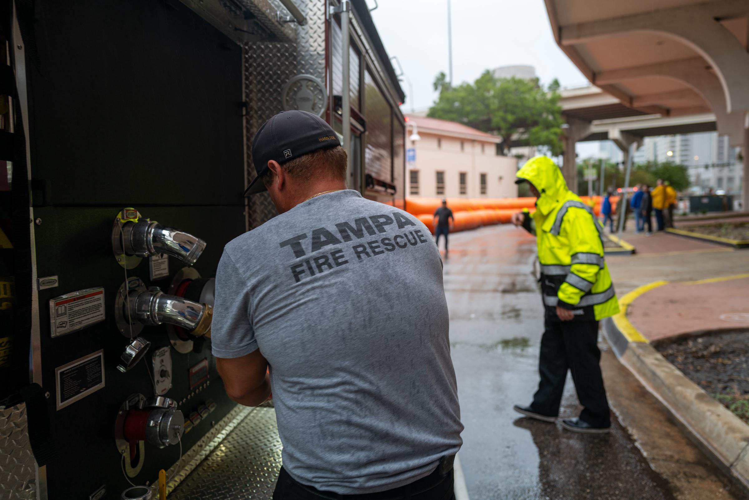 Authorities set up a flood barrier around a wastewater facility in preparation for Hurricane Milton on October 9, 2024 in Tampa, Florida | Source: Getty Images