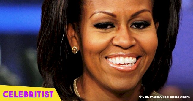 Michelle Obama stuns in striped outfit & loose curls in recent video for her book tour