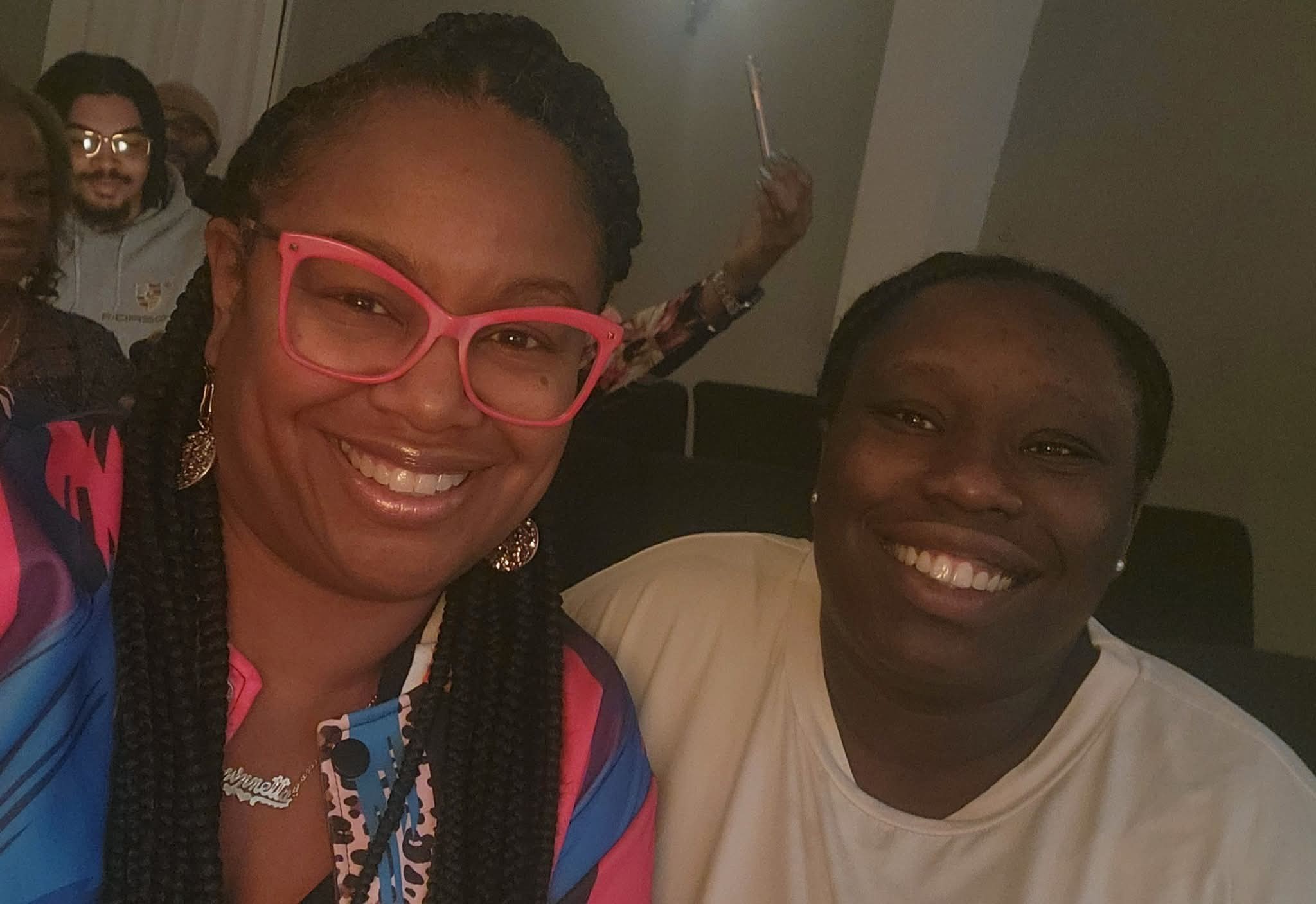 Riziki Ilenre and Shawnnetta Green, from a post dated December 14, 2025 | Source: Facebook/Walter D'Andre Green