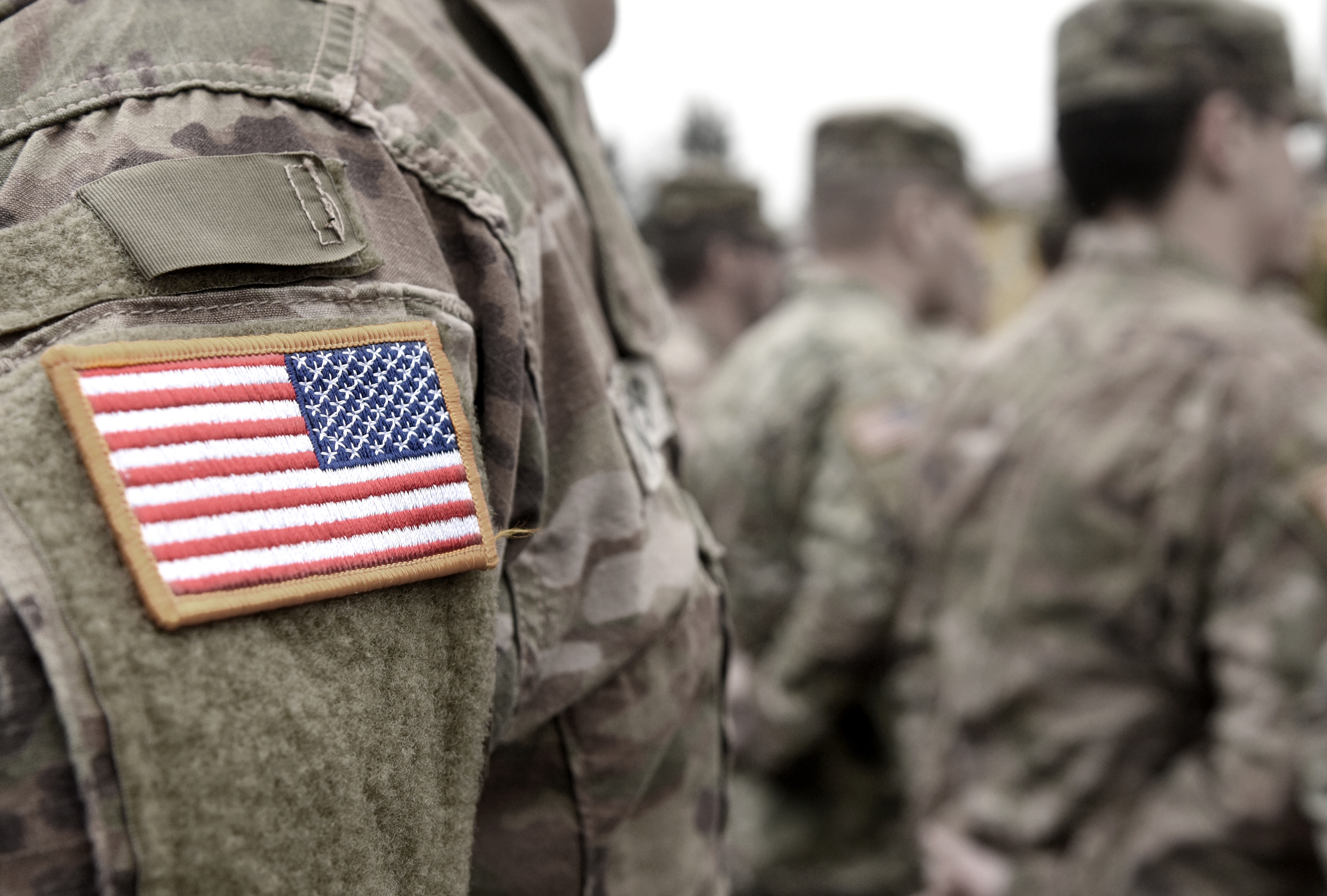 Close-up of the U.S. flag on a soldier's uniform | Source: Shutterstock