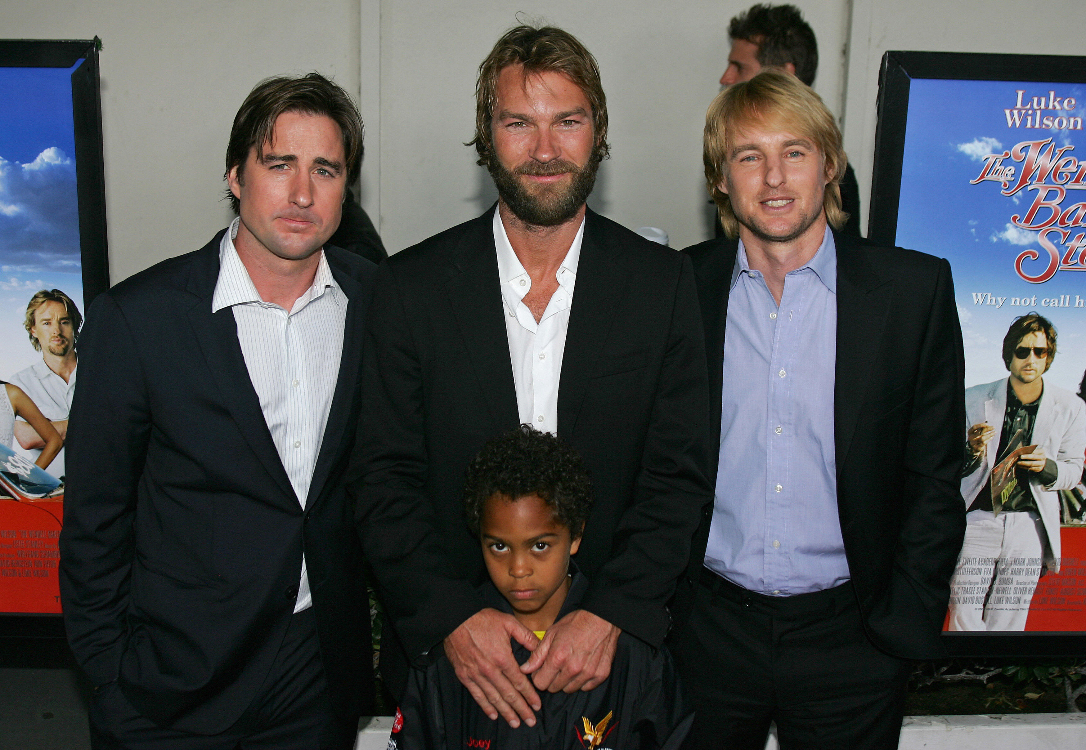 Owen Wilson poses his brothers Luke and Andrew Wilson, and his son Joey, at the premiere of "The Wendell Baker Story" in Beverly Hills, California, on May 2007 | Source: Getty Images