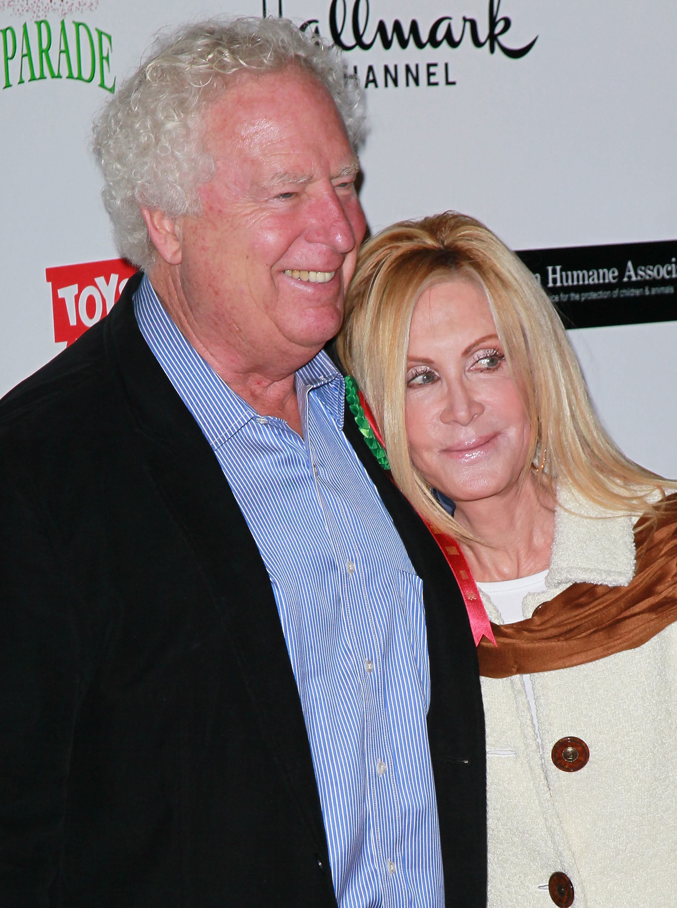 Joan Van Ark (R) and husband John Marshall attend the 80th anniversary Hollywood Christmas Parade benefiting Marine Toys for Tots on November 27, 2011 in Hollywood, California. | Source: Getty Images