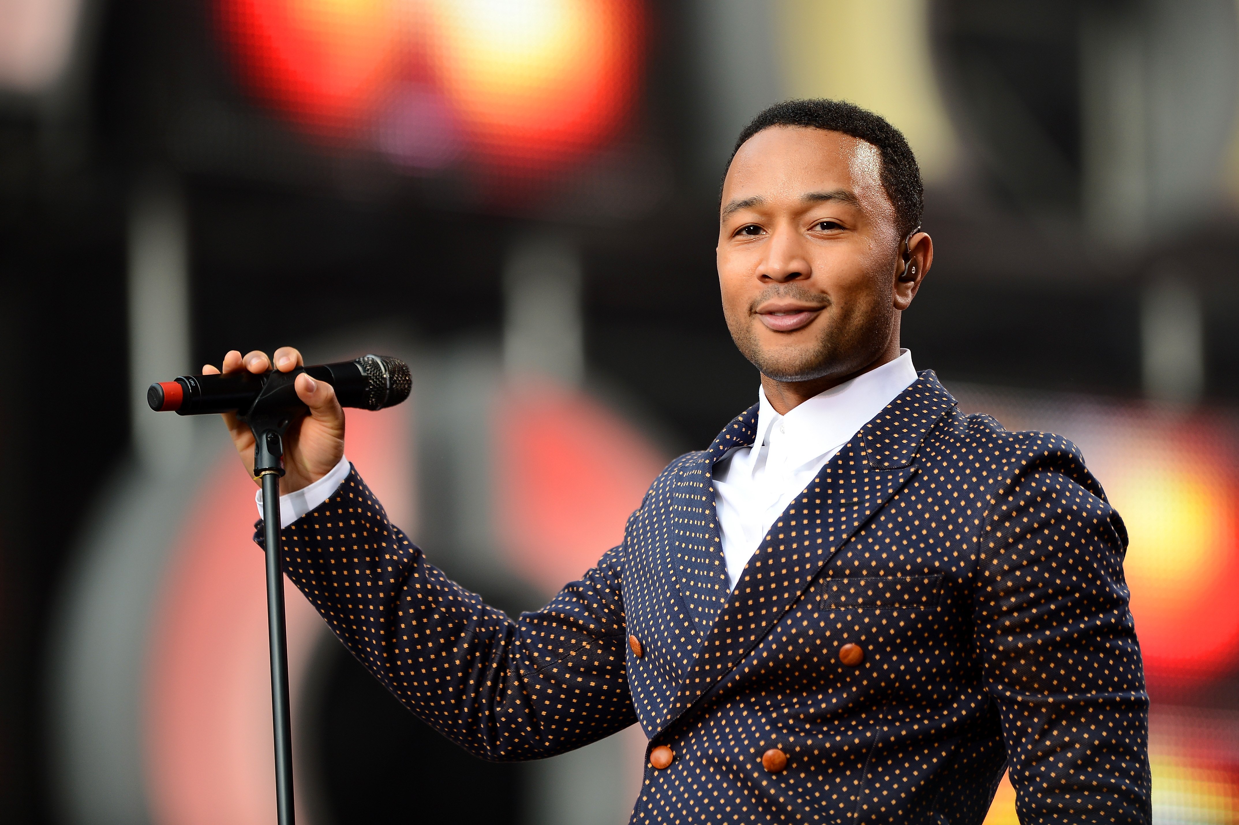 Singer John Legend performs on stage at the "Chime For Change: The Sound Of Change Live" Concert at Twickenham Stadium on June 1, 2013, in London, England. | Source: Getty Images.