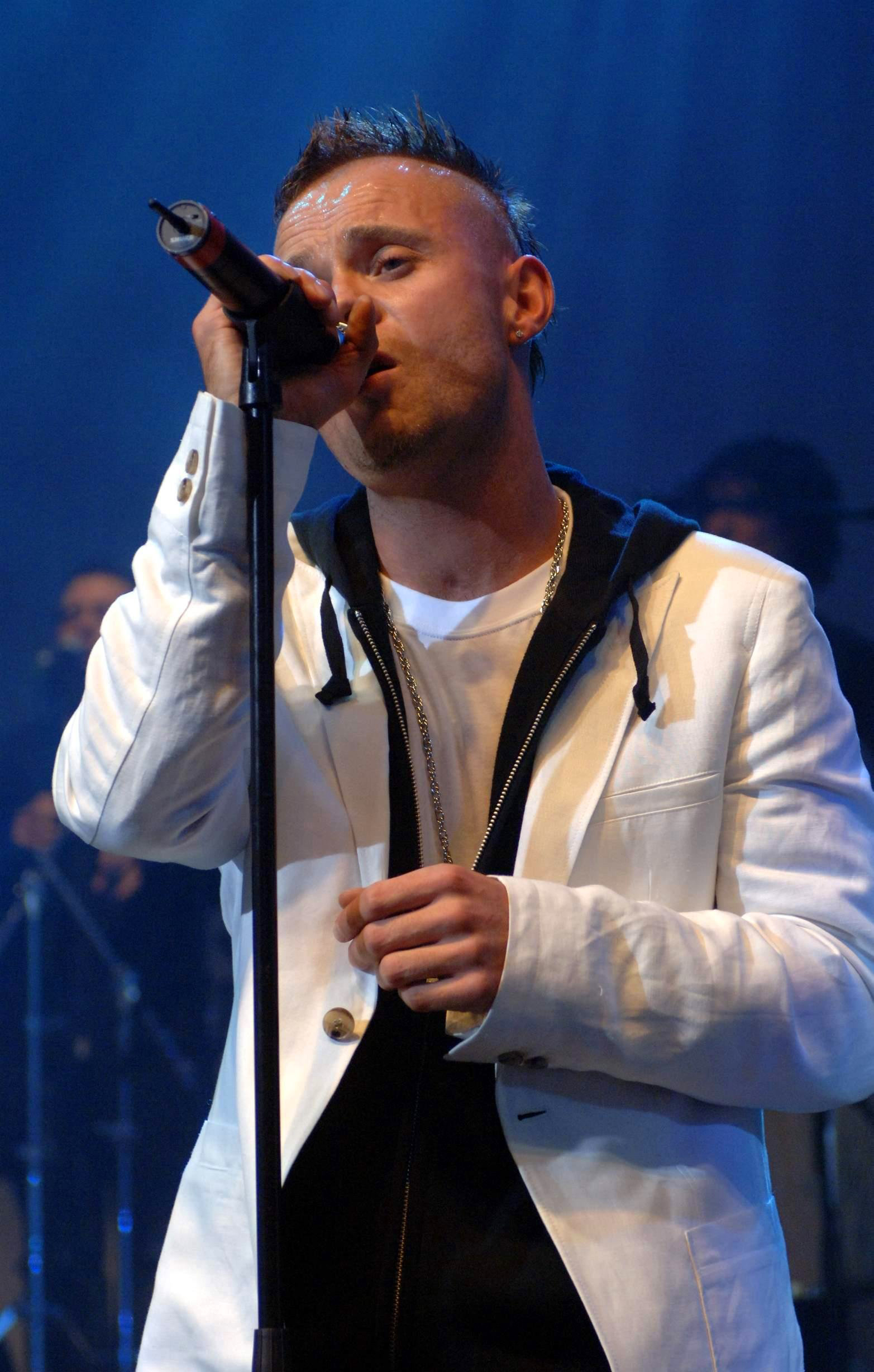 Brian Harvey of East 17 performs on stage during a reunion gig, at Shepherds Bush Empire, west London | Source: Getty Images