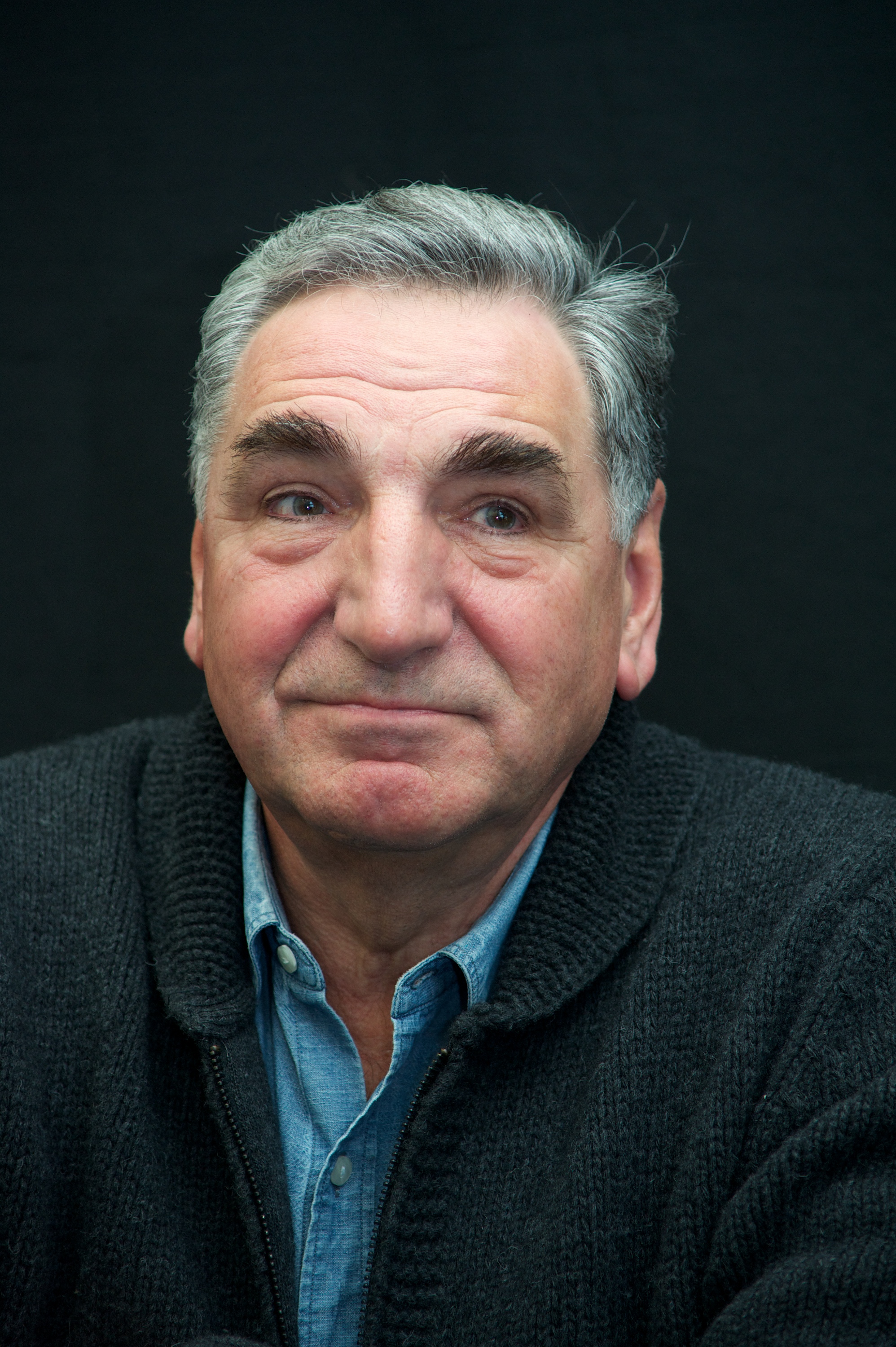 Jim Carter posed on the set of the TV series "Downton Abbey" at Highclere Castle in Newbury, England, on February 16, 2015. | Source: Getty Images