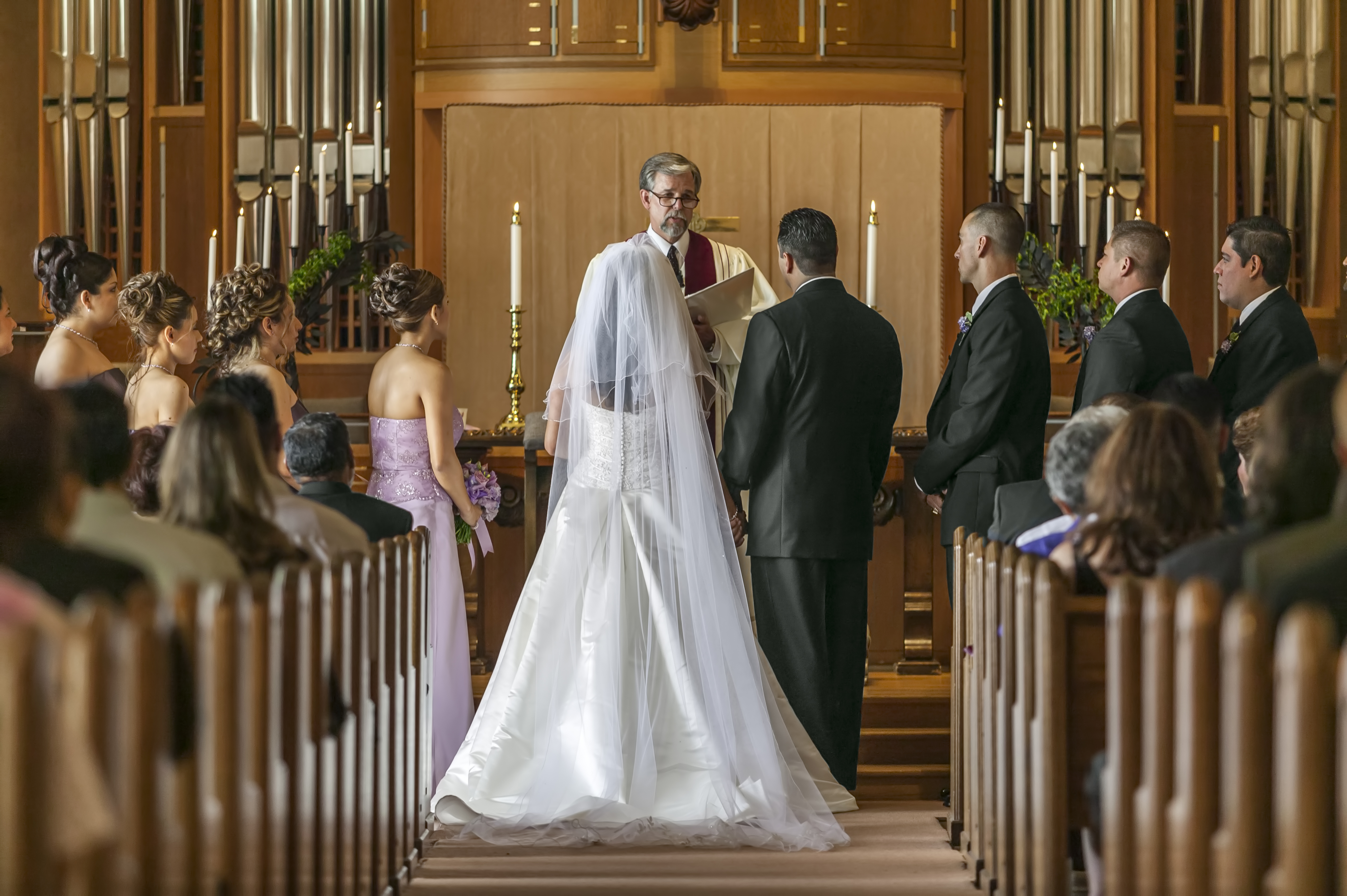 A bride and groom standing at the altar | Source: Getty Images