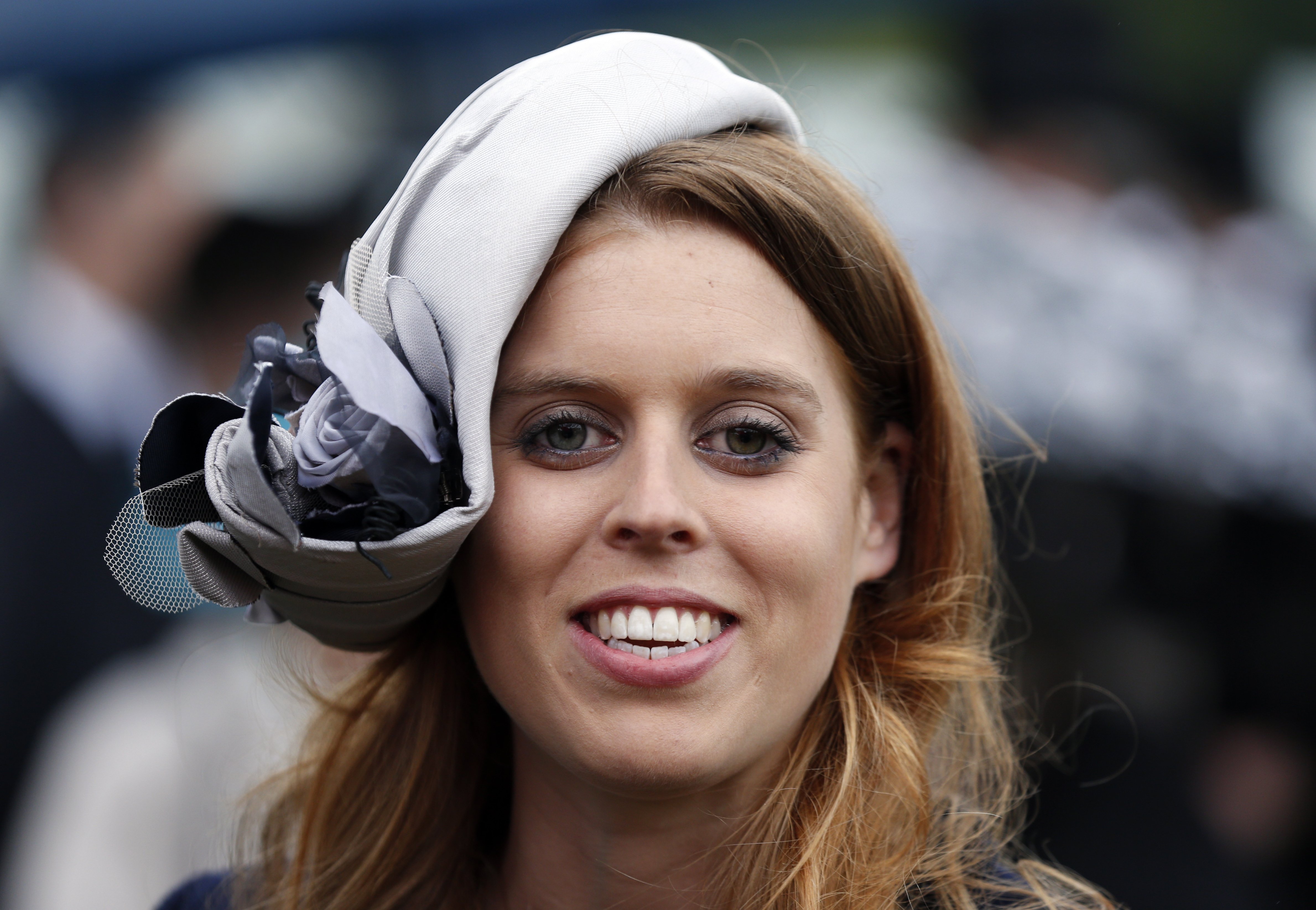 Princess Beatrice smiles during a garden party held at Buckingham Palace, on May 30, 2013 in London, England. | Source: Getty Images