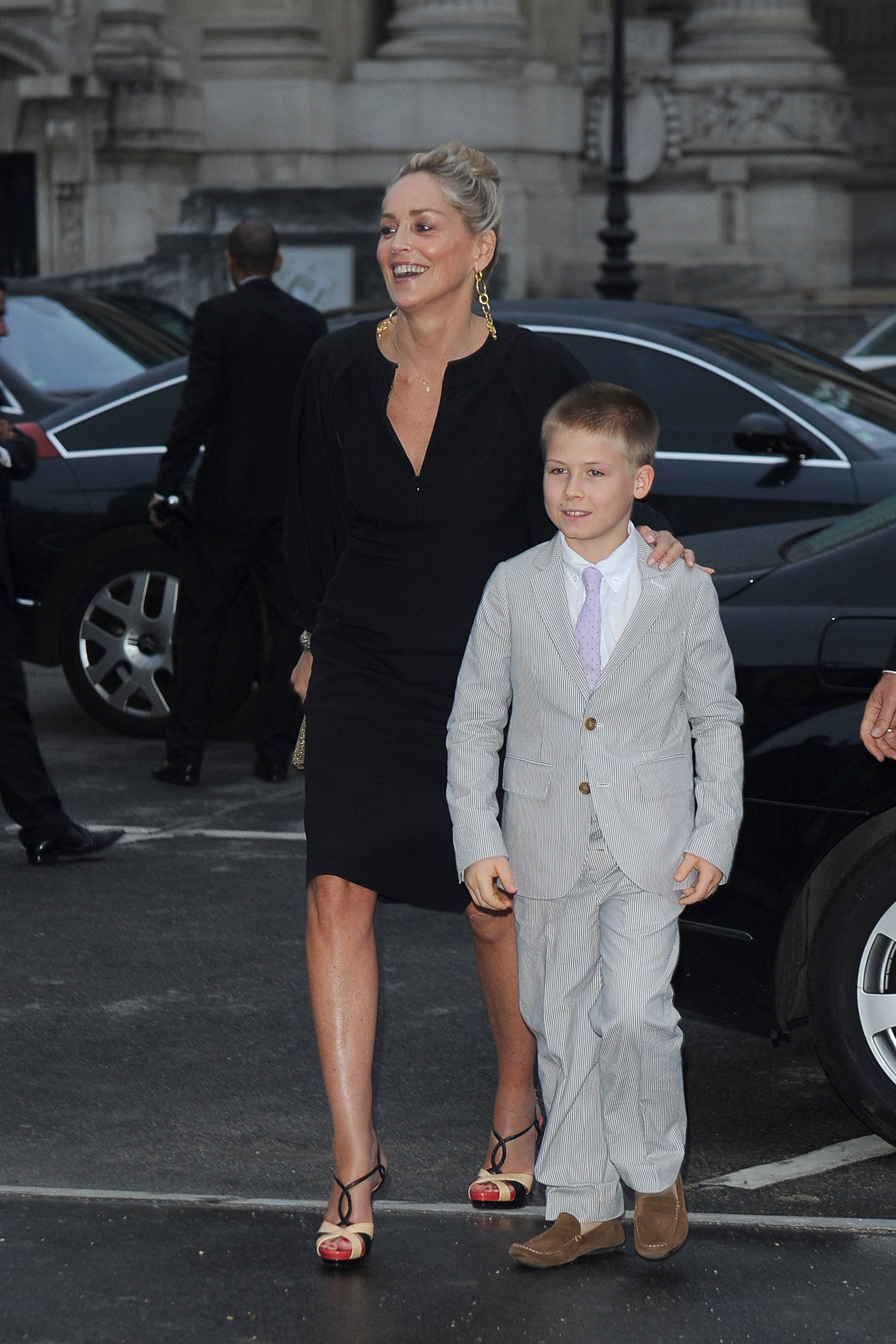 Sharon Stone and her son at "The Glory Of Water: Karl Lagerfeld's Exhibition Dinner" on July 3, 2013, in Paris, France. | Source: Jacopo Raule/FilmMagic/Getty Images