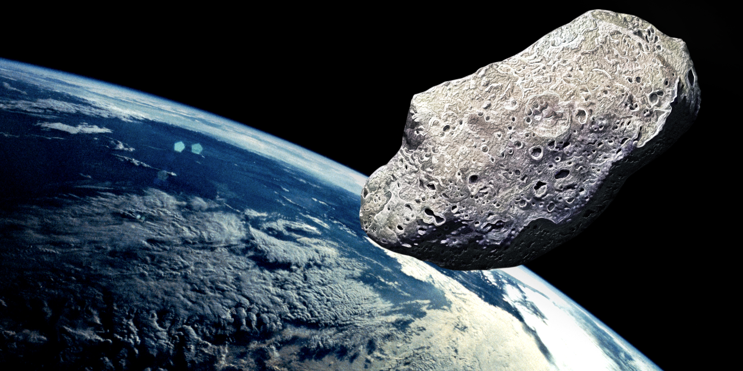 An asteroid and Earth | Source: Getty Images