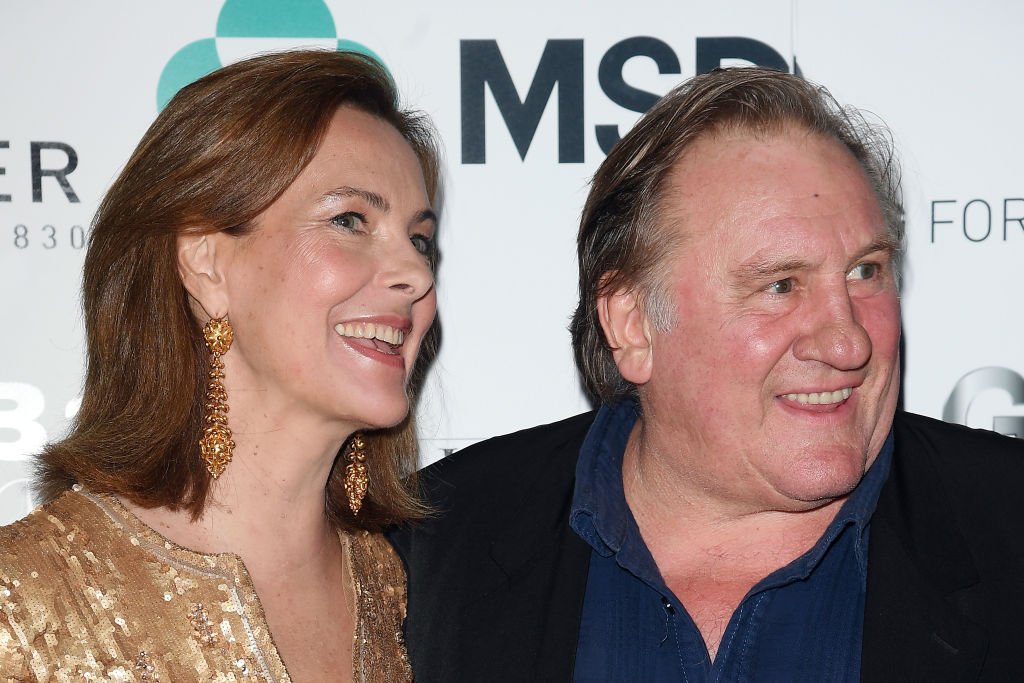 Carole Bouquet et Gérard Depardieu assistent au dîner de gala du Prix des Nations le 28 juillet 2017 à Taormina, Italie. | Photo : Getty Images