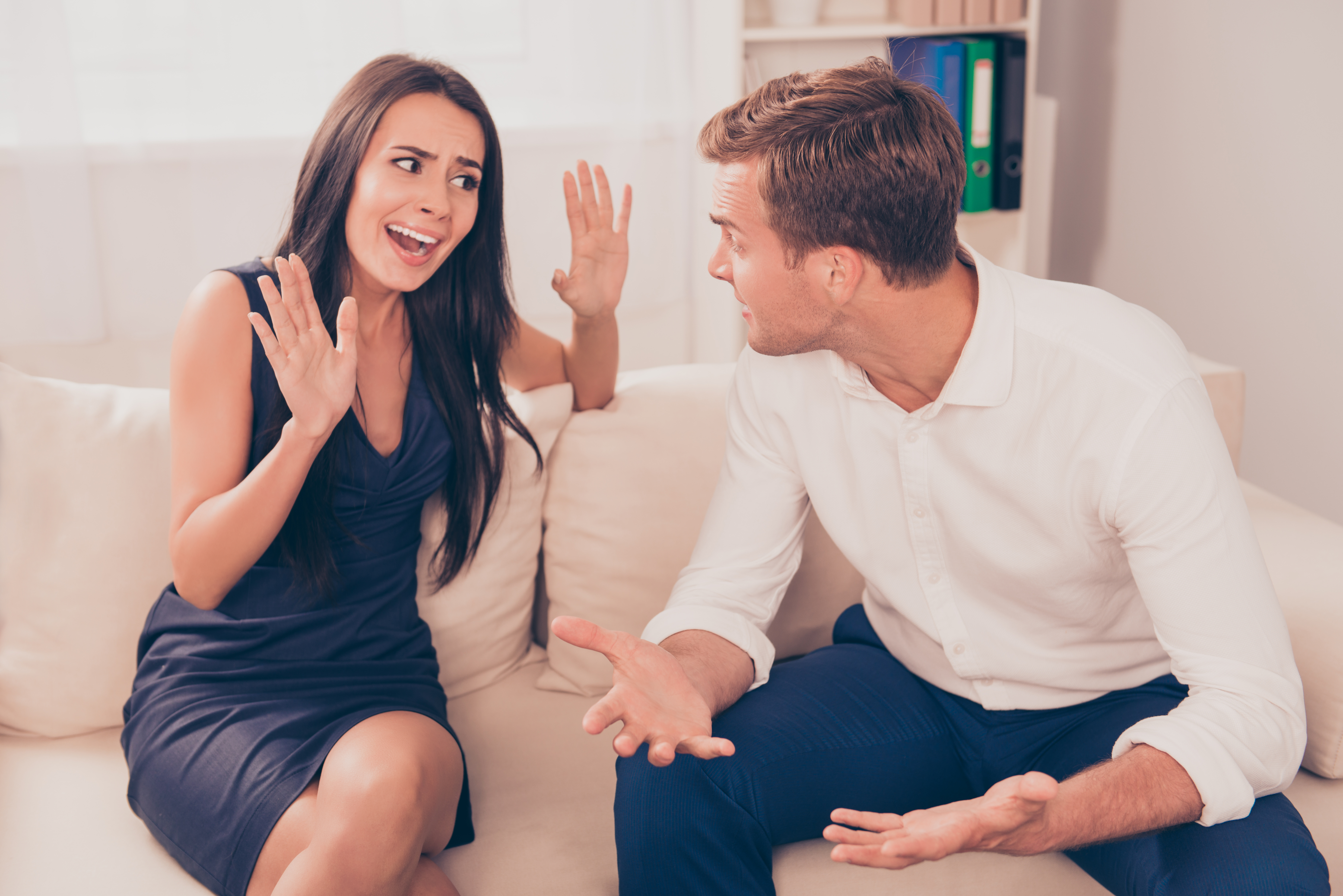 A couple having a heated disagreement | Source: Shutterstock