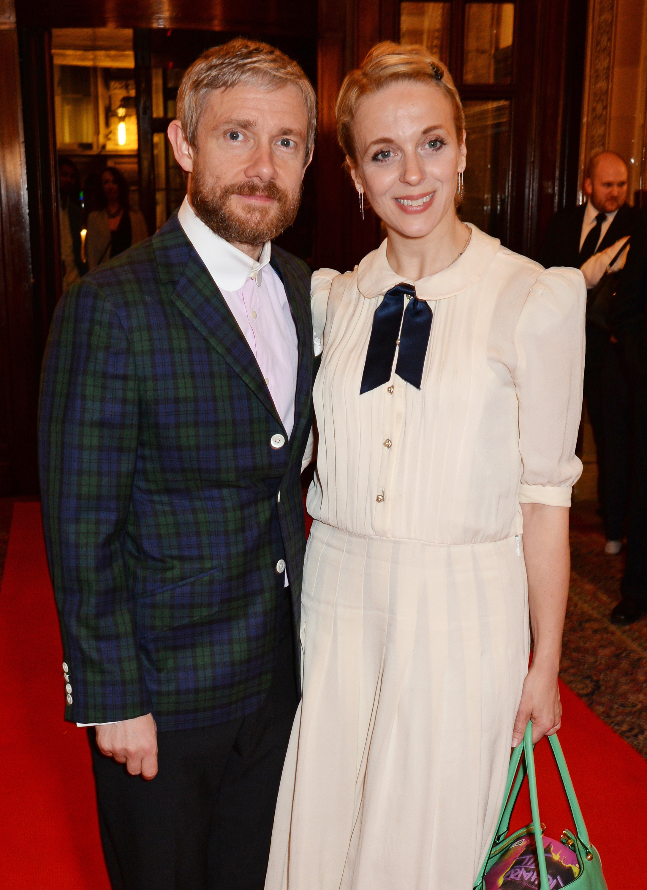 Martin Freeman and Amanda Abbington pose at an after party celebrating the Gala Night performance of "Richard III", playing at the Trafalgar Studios, at One Whitehall Place on July 9, 2014, in London, England | Source: Getty Images
