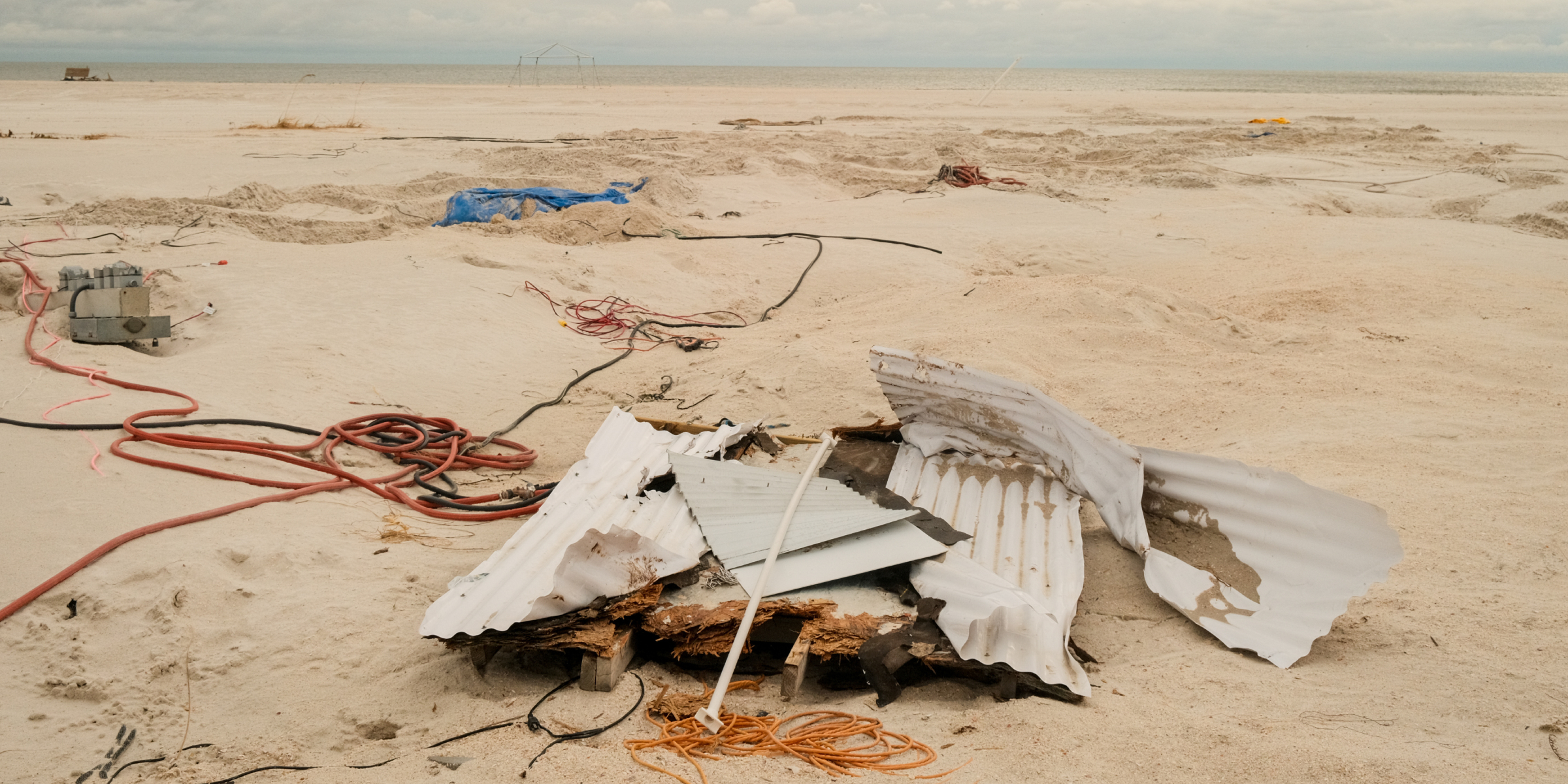 Debris and damaged equipment scattered across a coastal area | Source: Getty Images