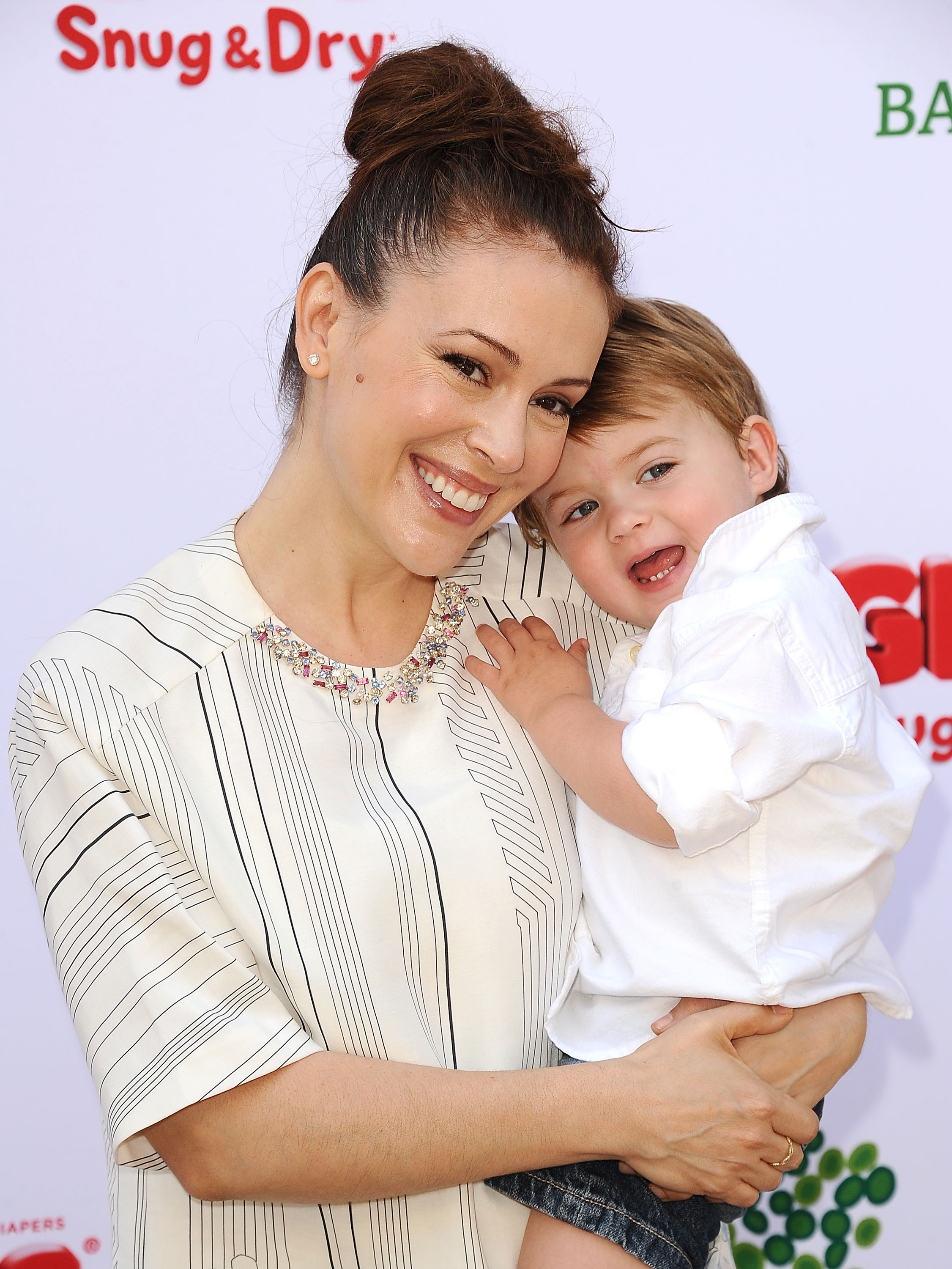 Alyssa Milano and Milo Bugliari at the Baby2Baby Mother's Day garden party on April 27, 2013 in Los Angeles, California | Source: Getty Images