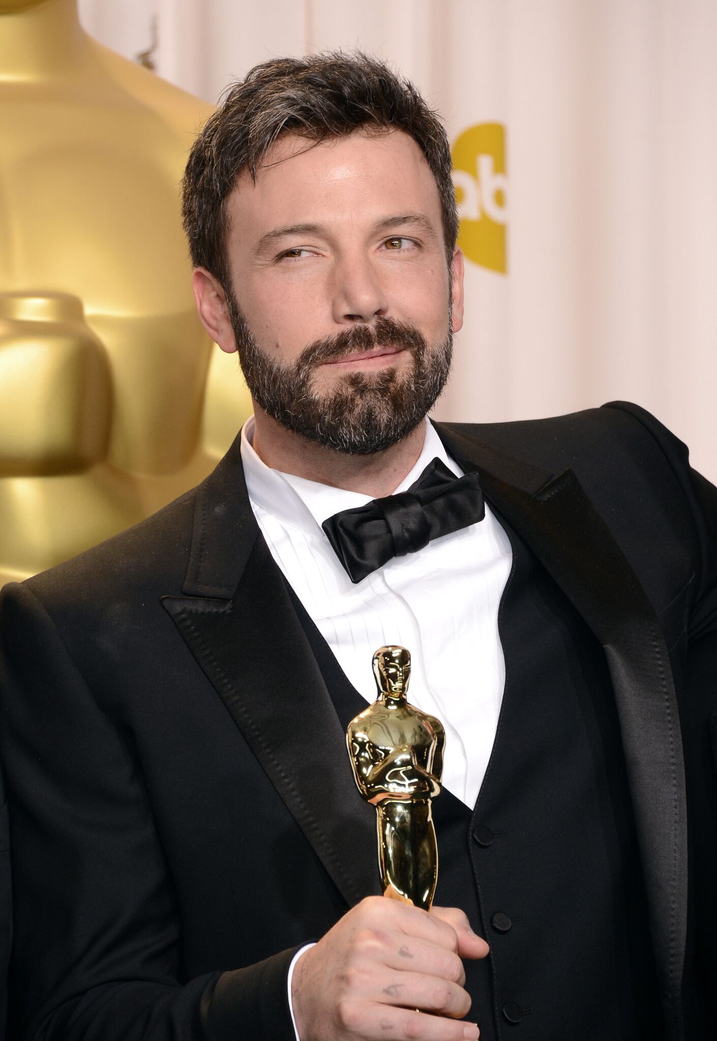 Ben Affleck, winner of the Best Picture award for "Argo," poses in the press room during the Oscars | Getty Images