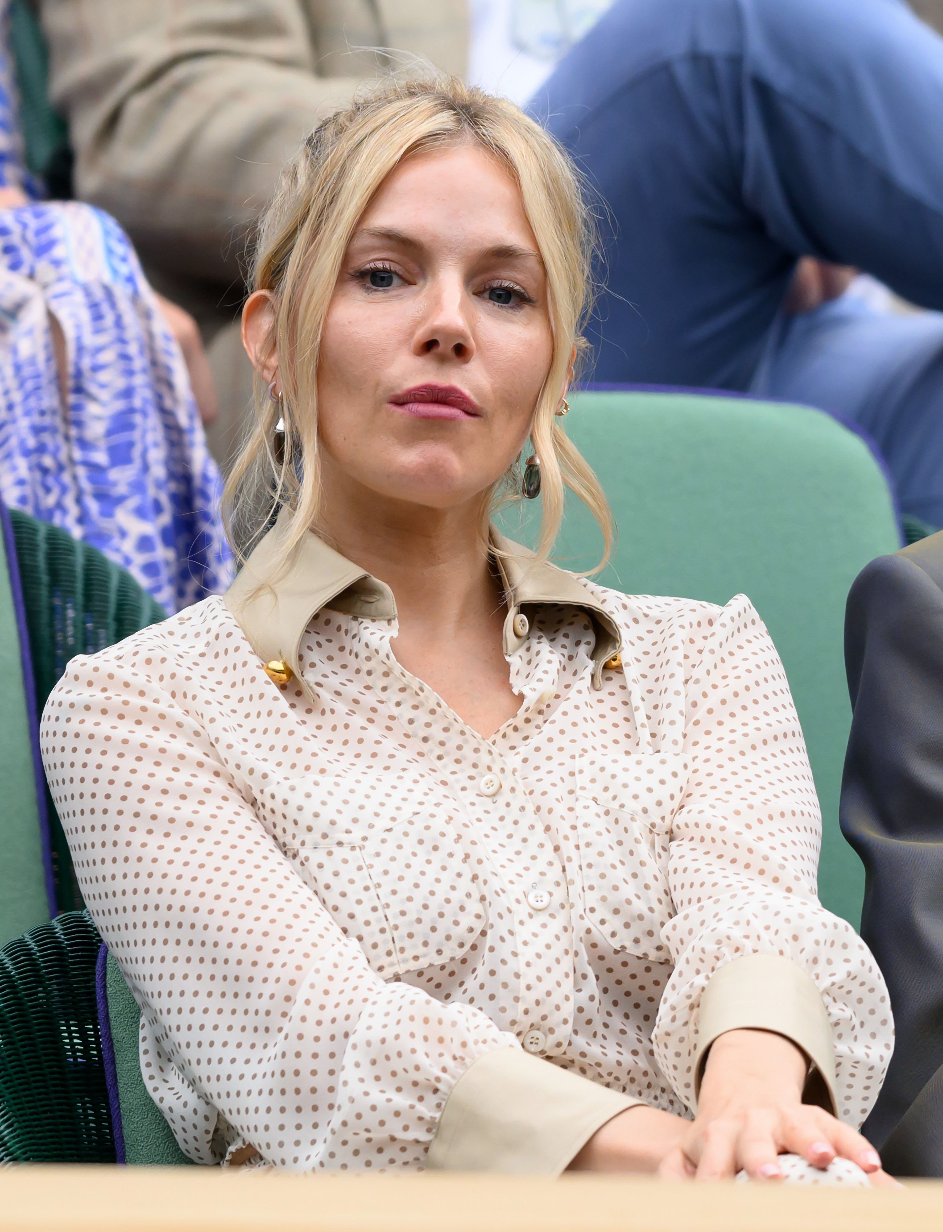 Sienna Miller attends Day 9 of the Wimbledon Tennis Championships at the All England Lawn Tennis and Croquet Club on 9 July 2024 in London, England. | Source: Getty Images