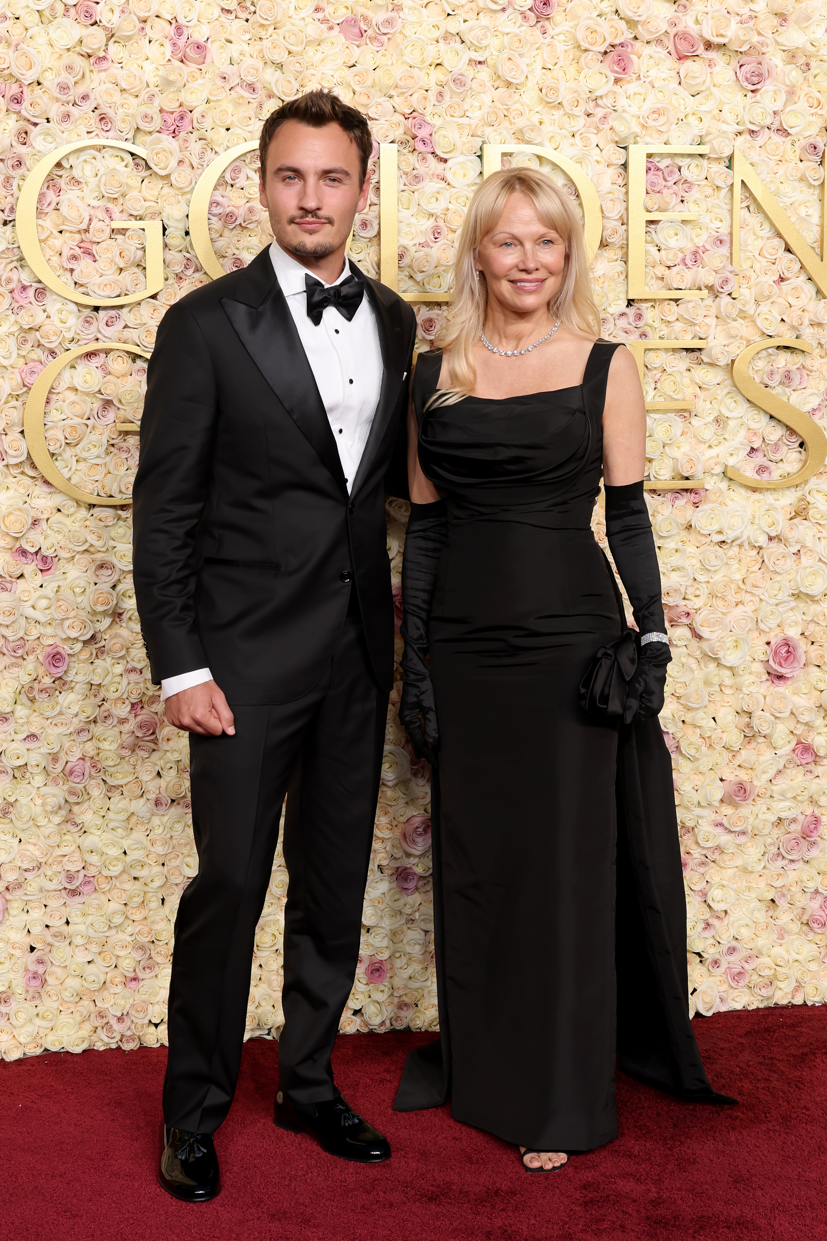 Pamela Anderson and her son Brandon Thomas Lee at the 82nd annual Golden Globe Awards in Beverly Hills, California, on January 5, 2025. | Source: Getty Images