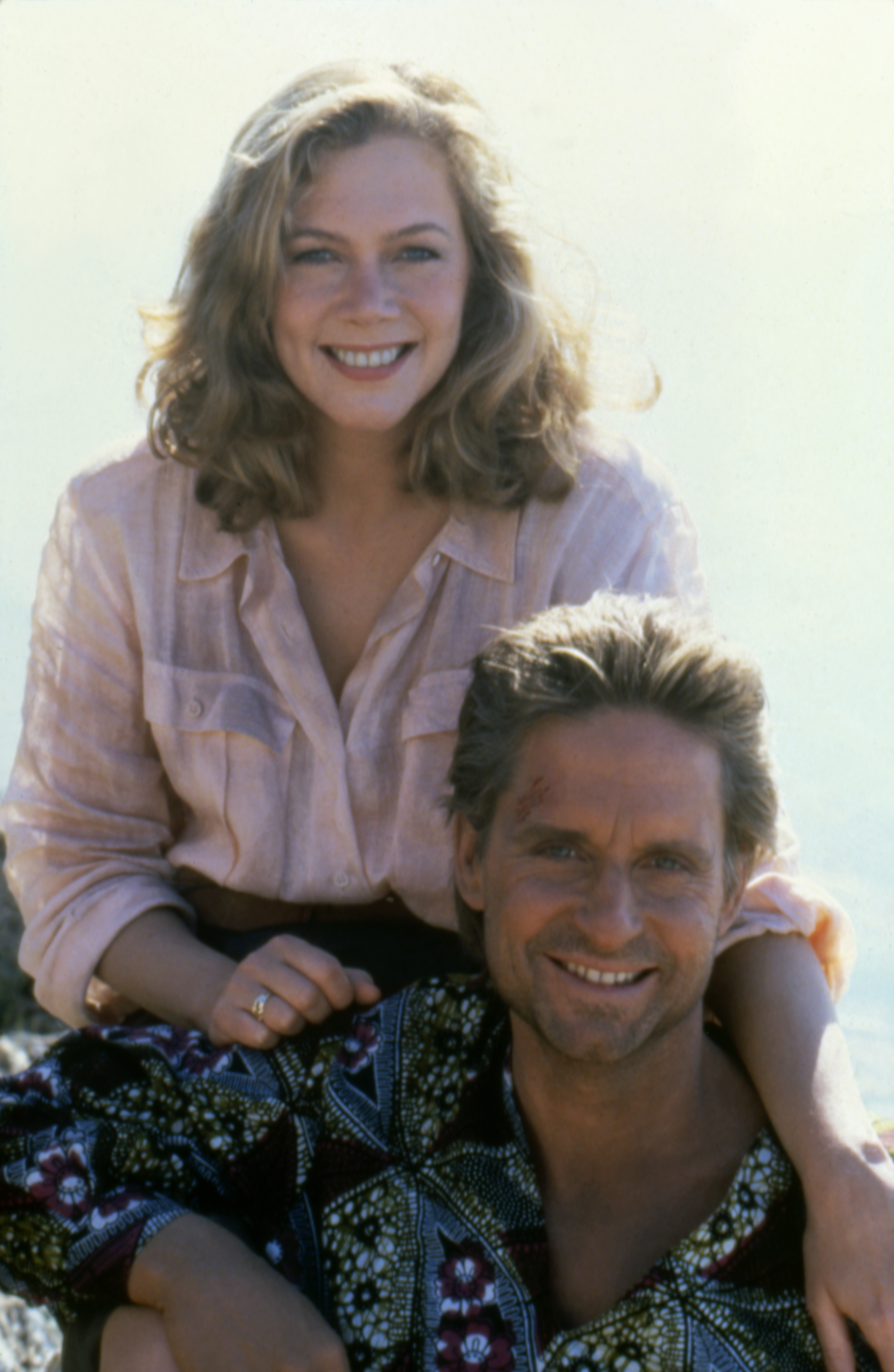 Kathleen Turner and Michael Douglas posing on the set of "The Jewel of the Nile" in 1985 | Source: Getty Images